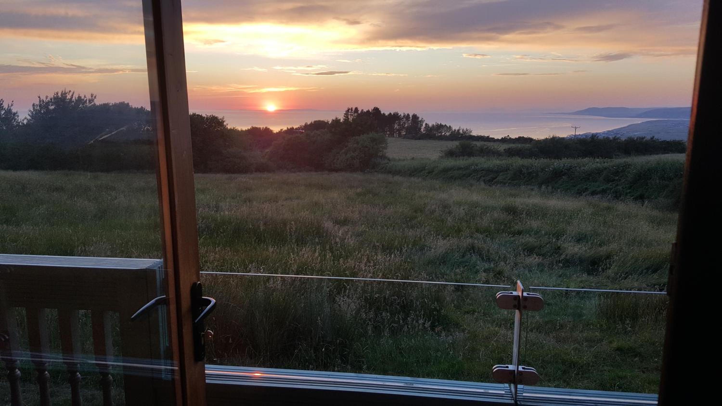 Enlli Fach cabin sleep's 2 adults and 2 children 2 dogs welcome not suitable for contract workers due to parking height restrictions view 2