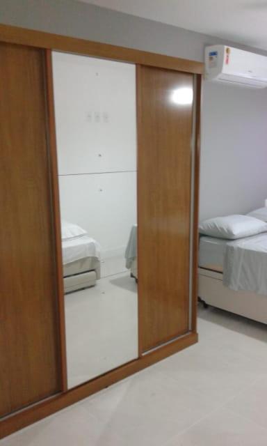 Flat com praia privativa e lazer total em Arraial