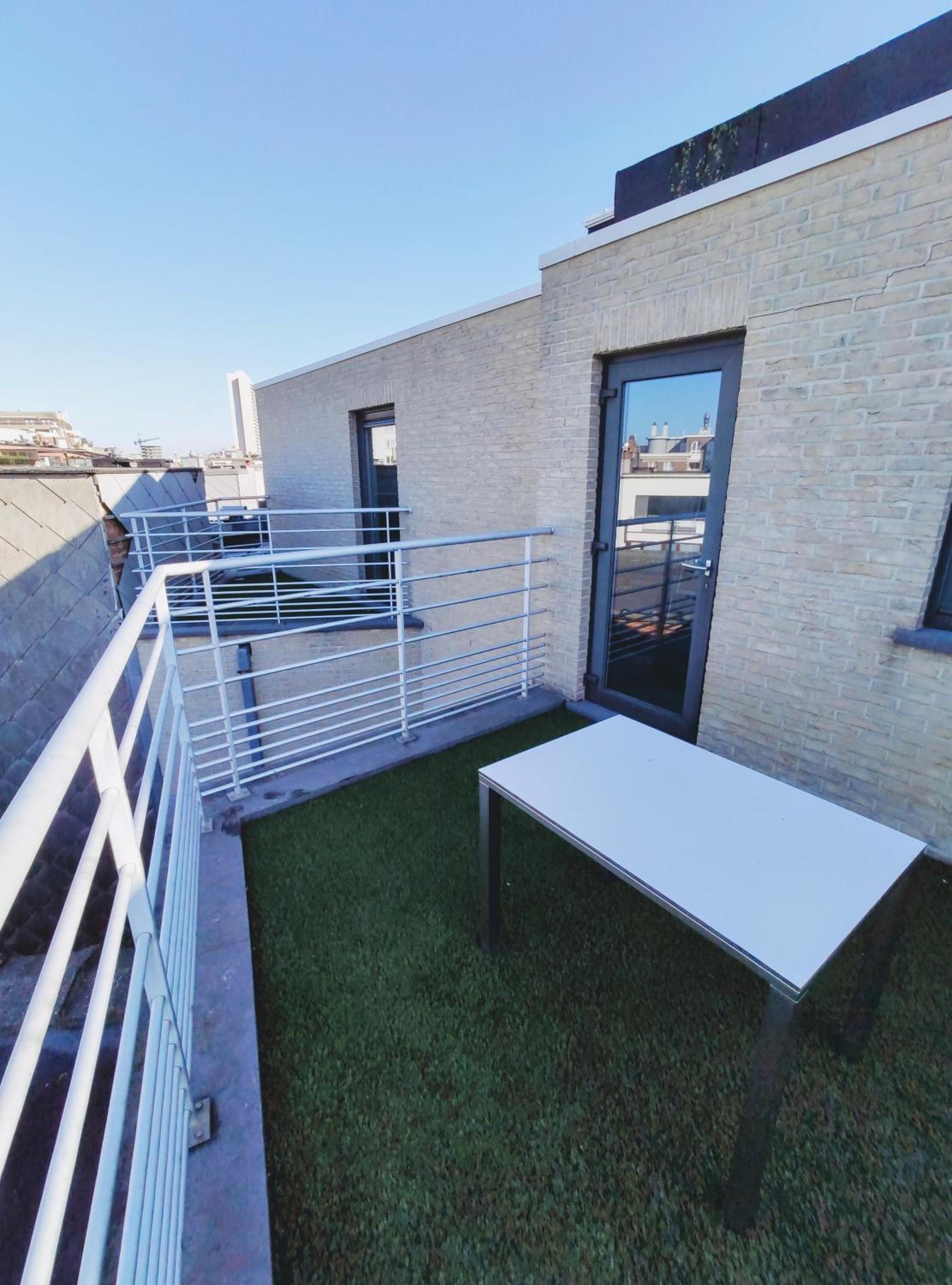 Penthouse met groot terras Oostende view 4
