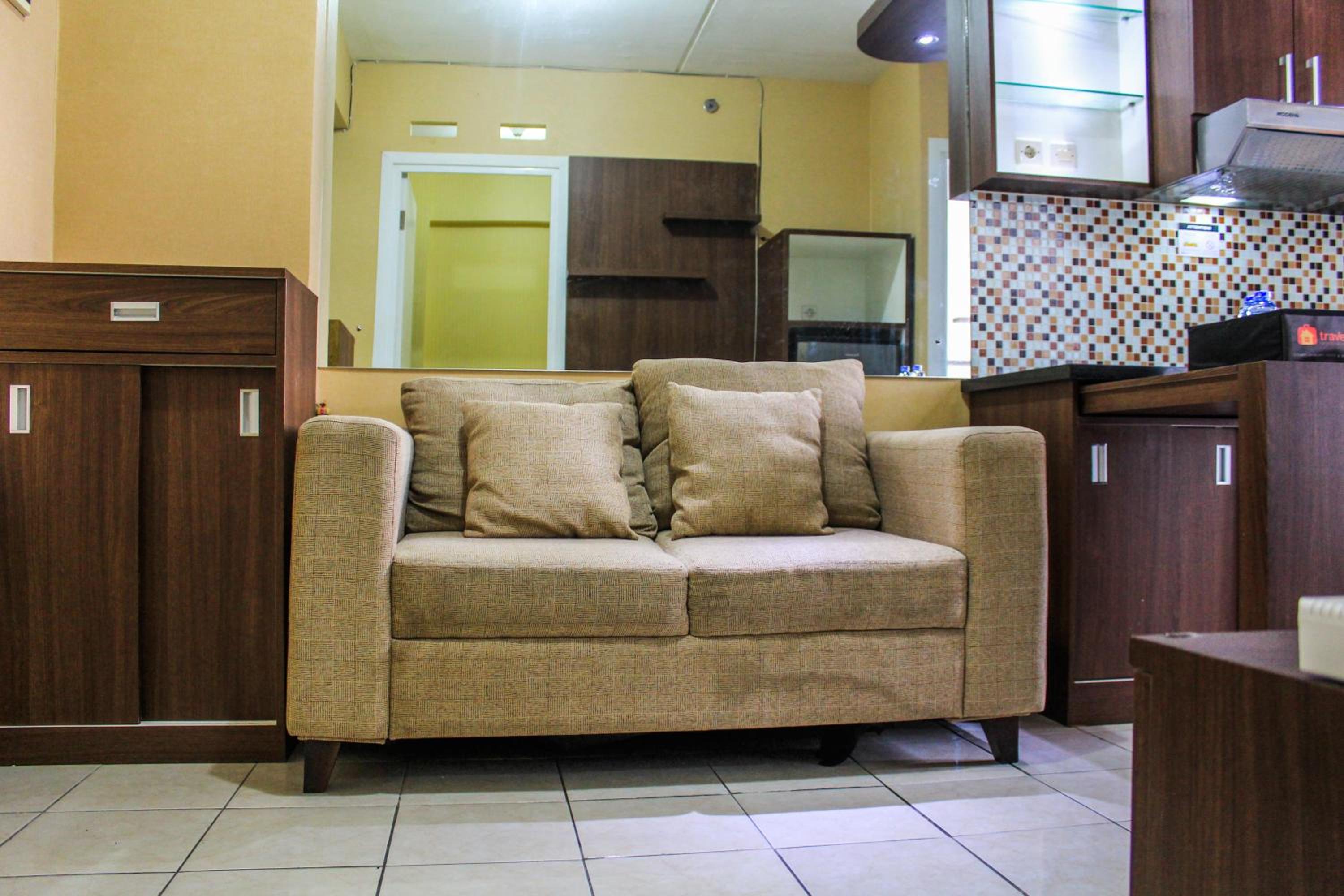 Comfortable and Tranquil 2BR Apartment at Green Pramuka By Travelio view 5