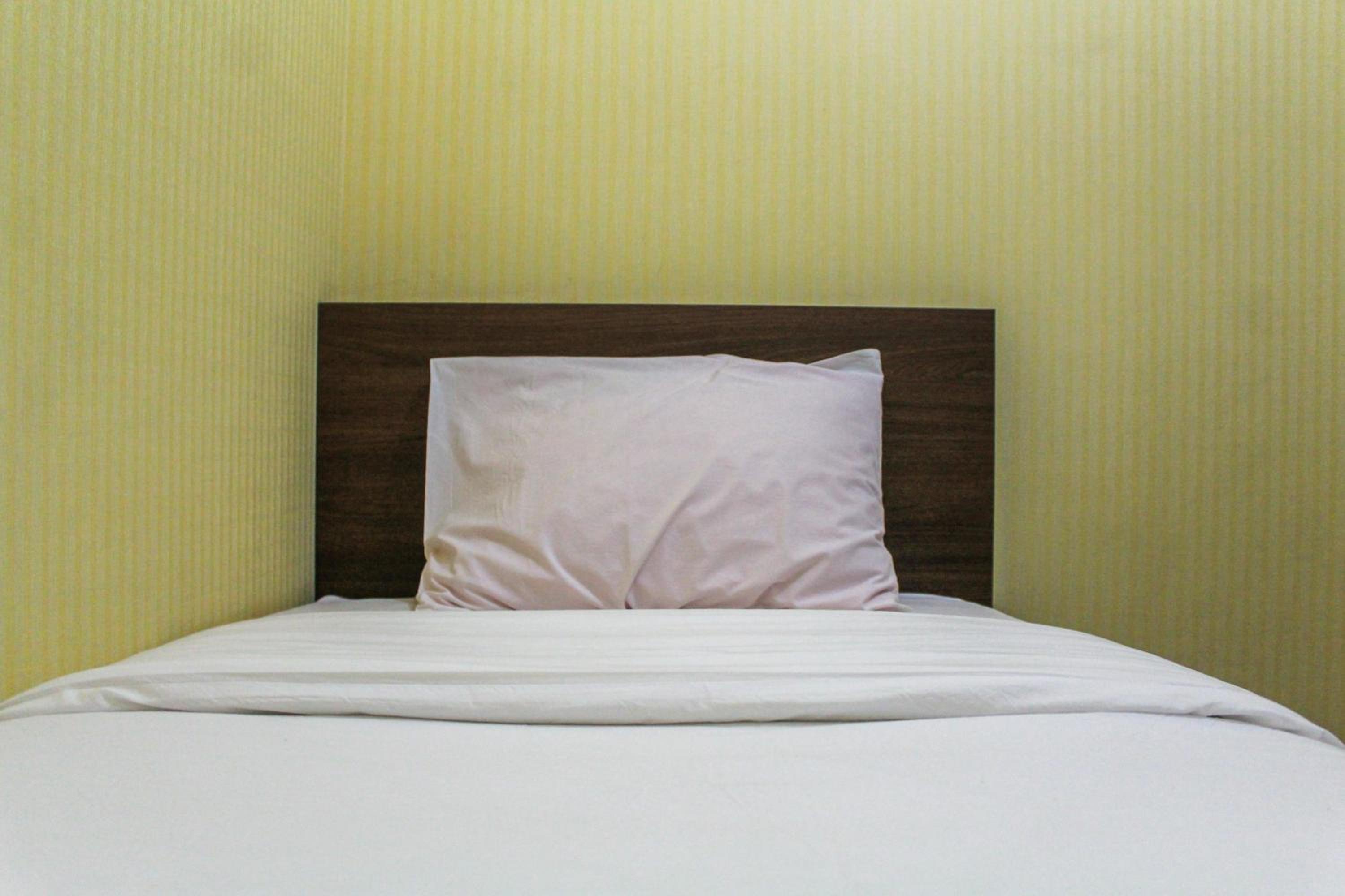 Comfortable and Tranquil 2BR Apartment at Green Pramuka By Travelio view 3