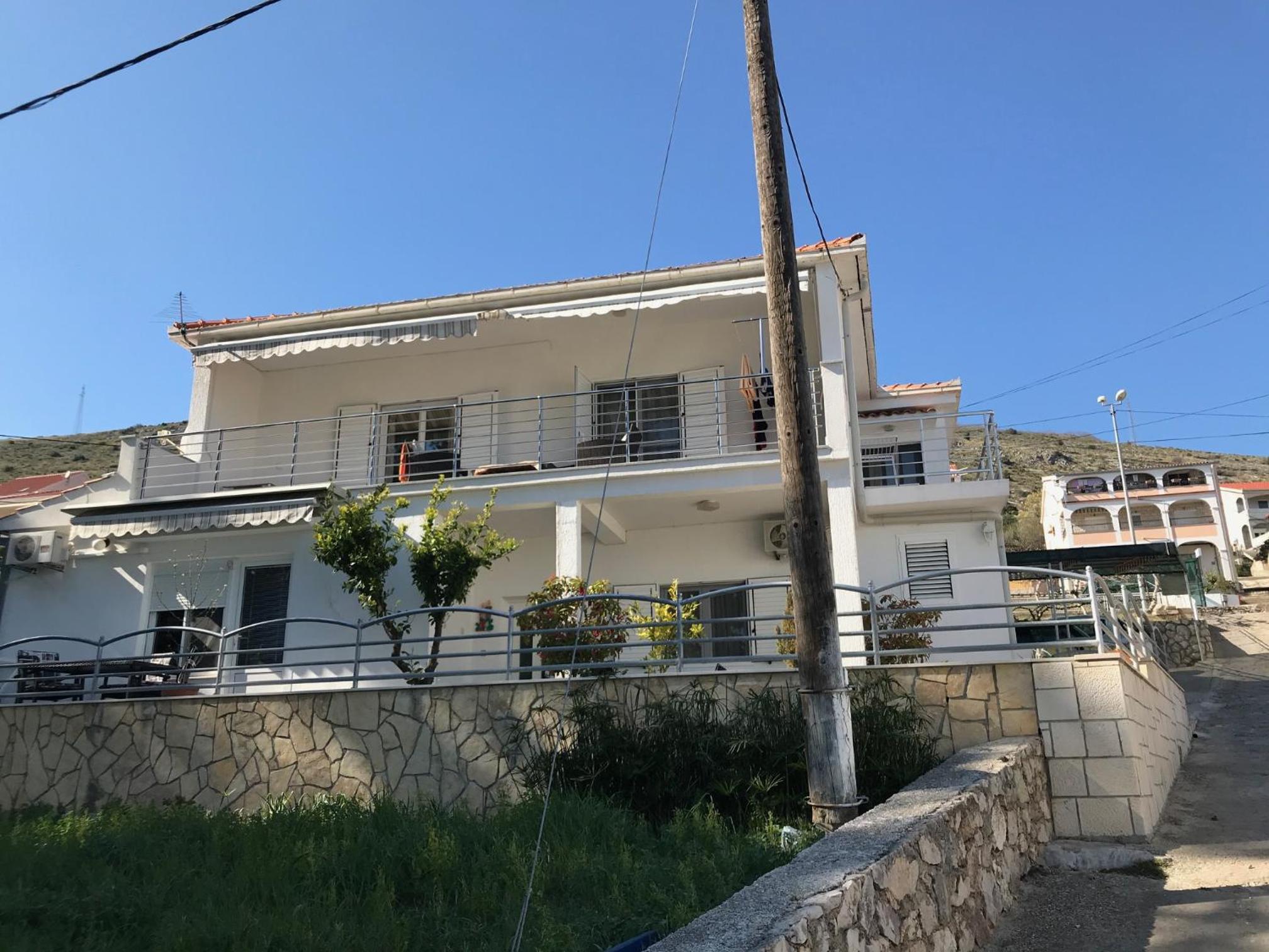 TONA APARTMENTS