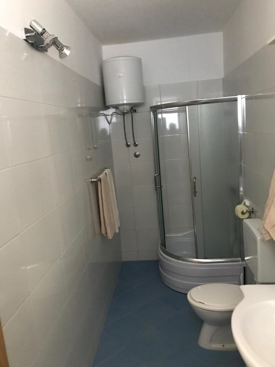 TONA APARTMENTS