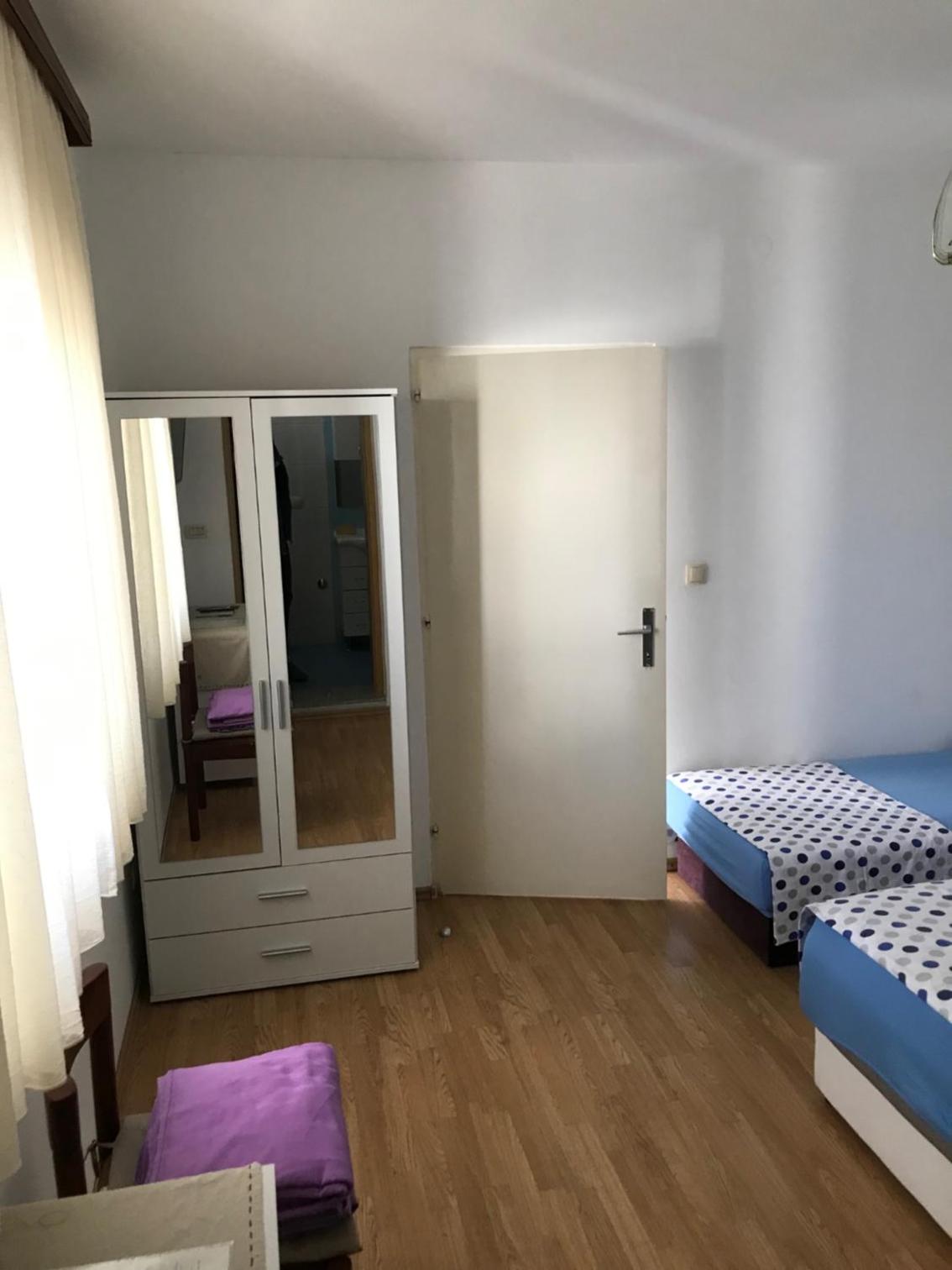 TONA APARTMENTS