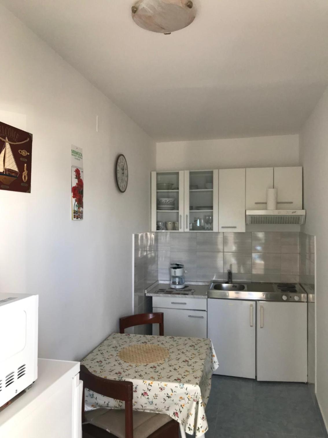 TONA APARTMENTS