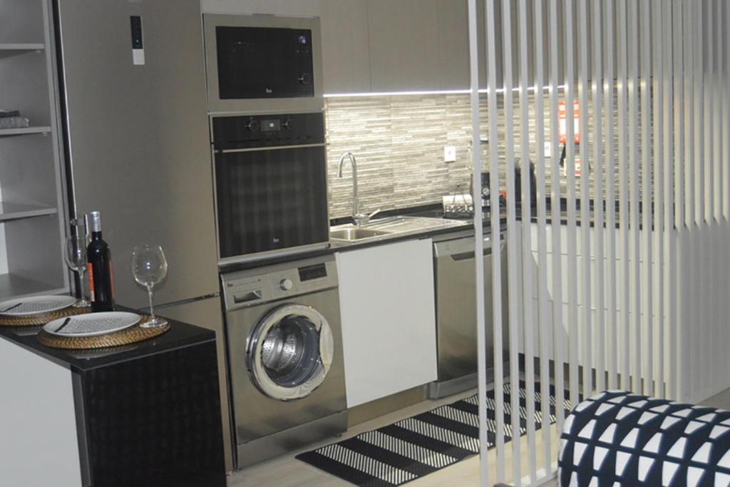 Cosy House en Albufeira — kitchen