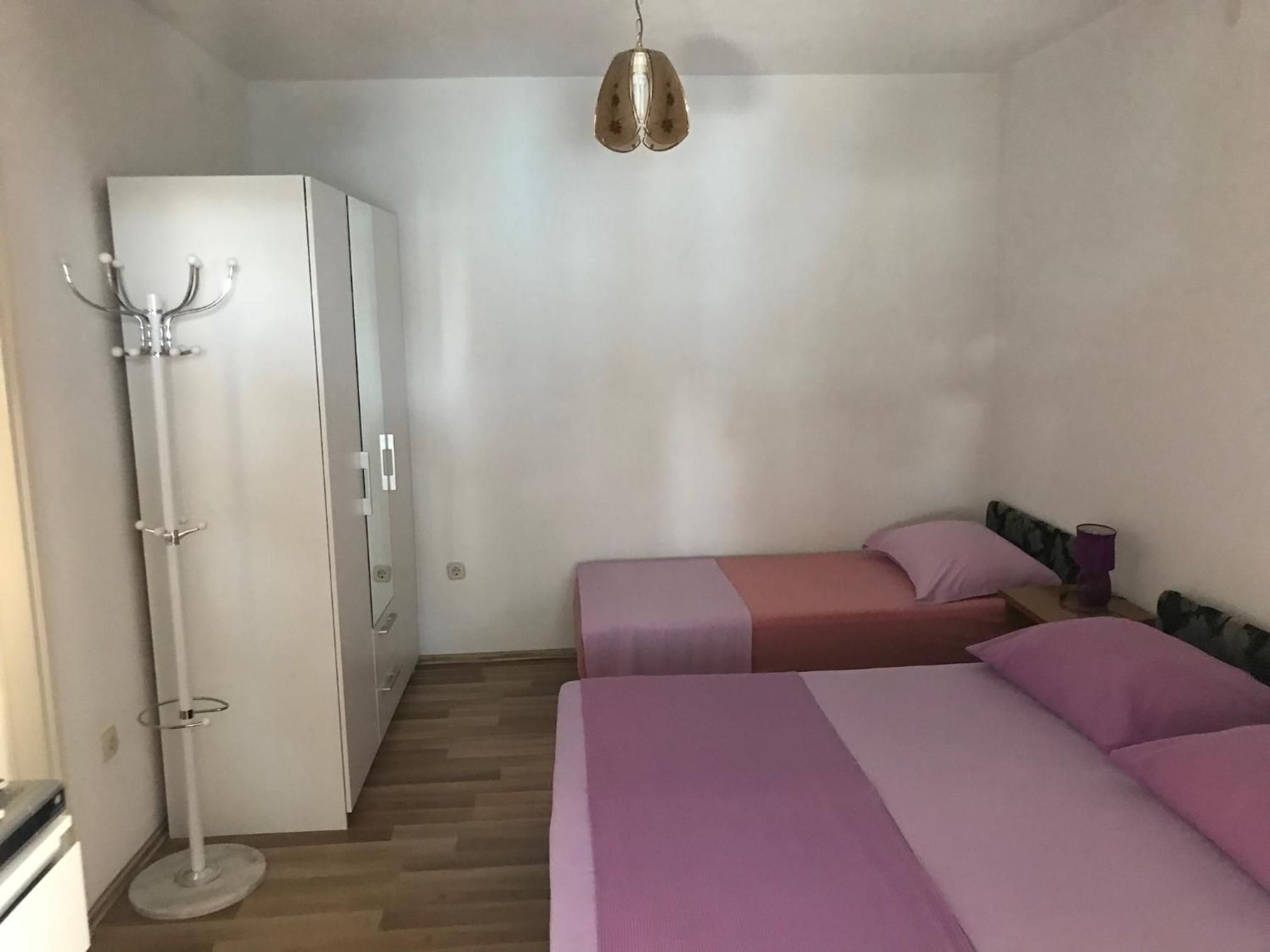 TONA APARTMENTS