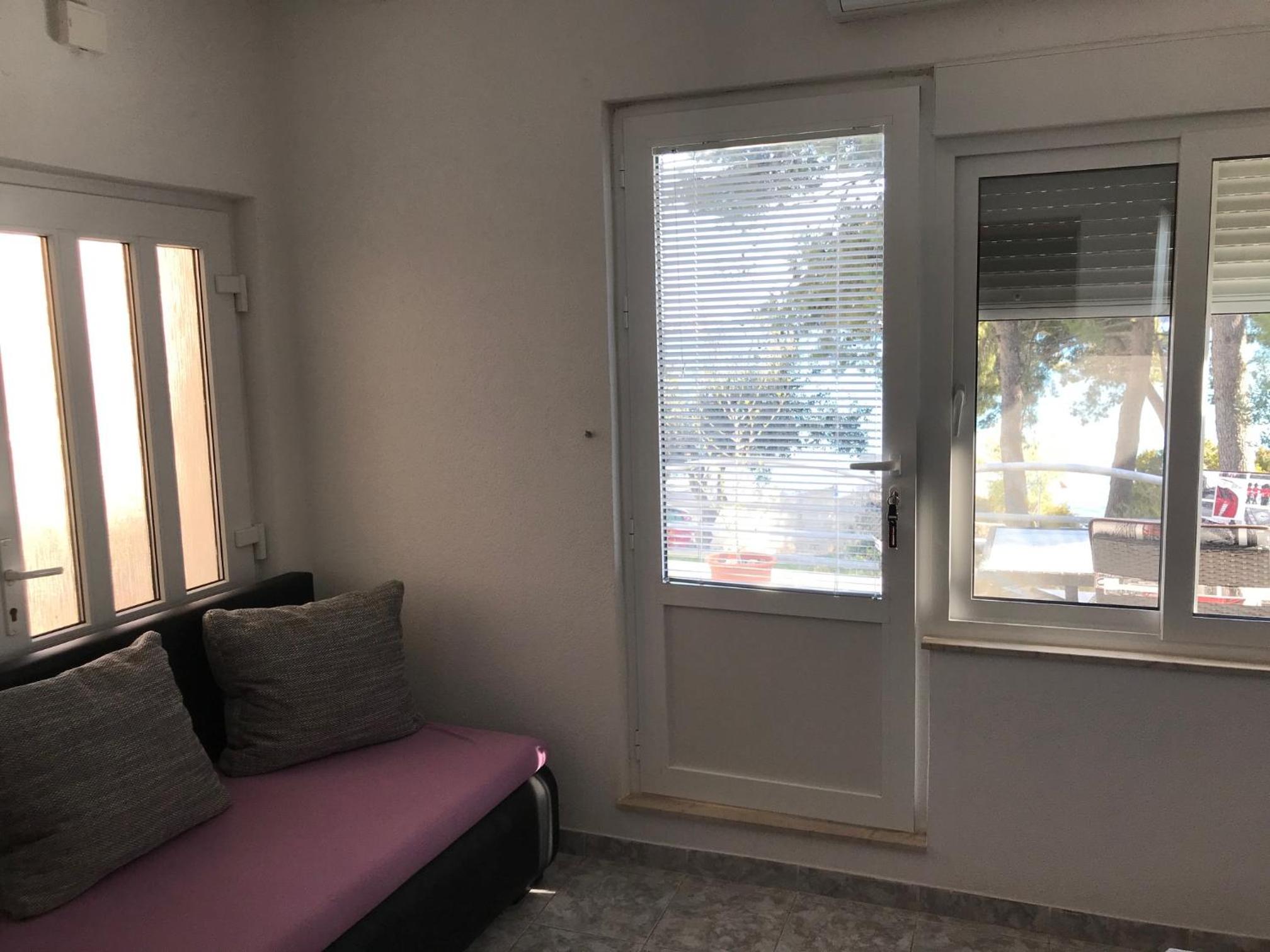 TONA APARTMENTS