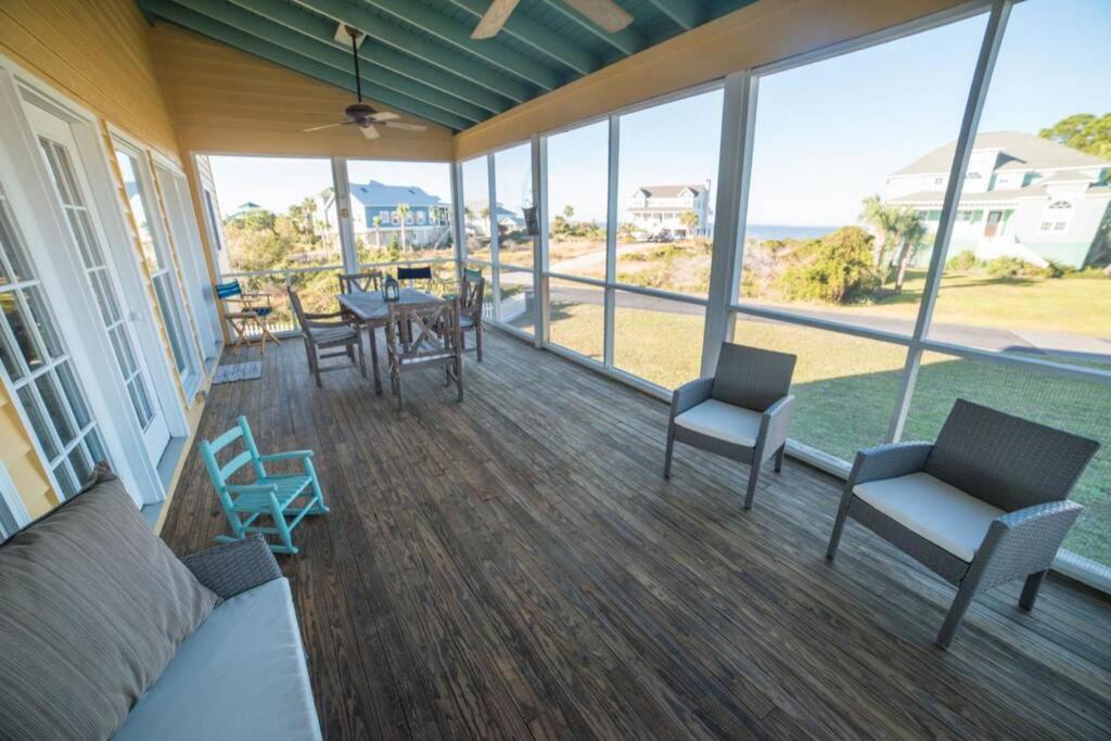 Southern Sunshine! Beach views and steps to the sand, short golf cart ride to the pool. view 3