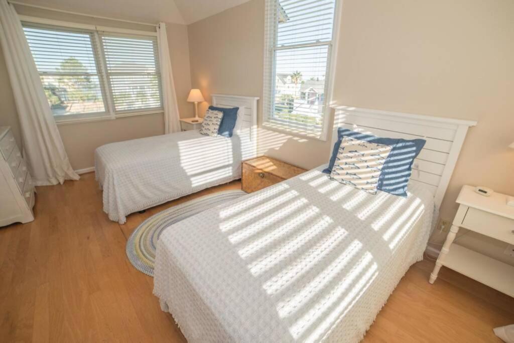 Southern Sunshine! Beach views and steps to the sand, short golf cart ride to the pool. view 5