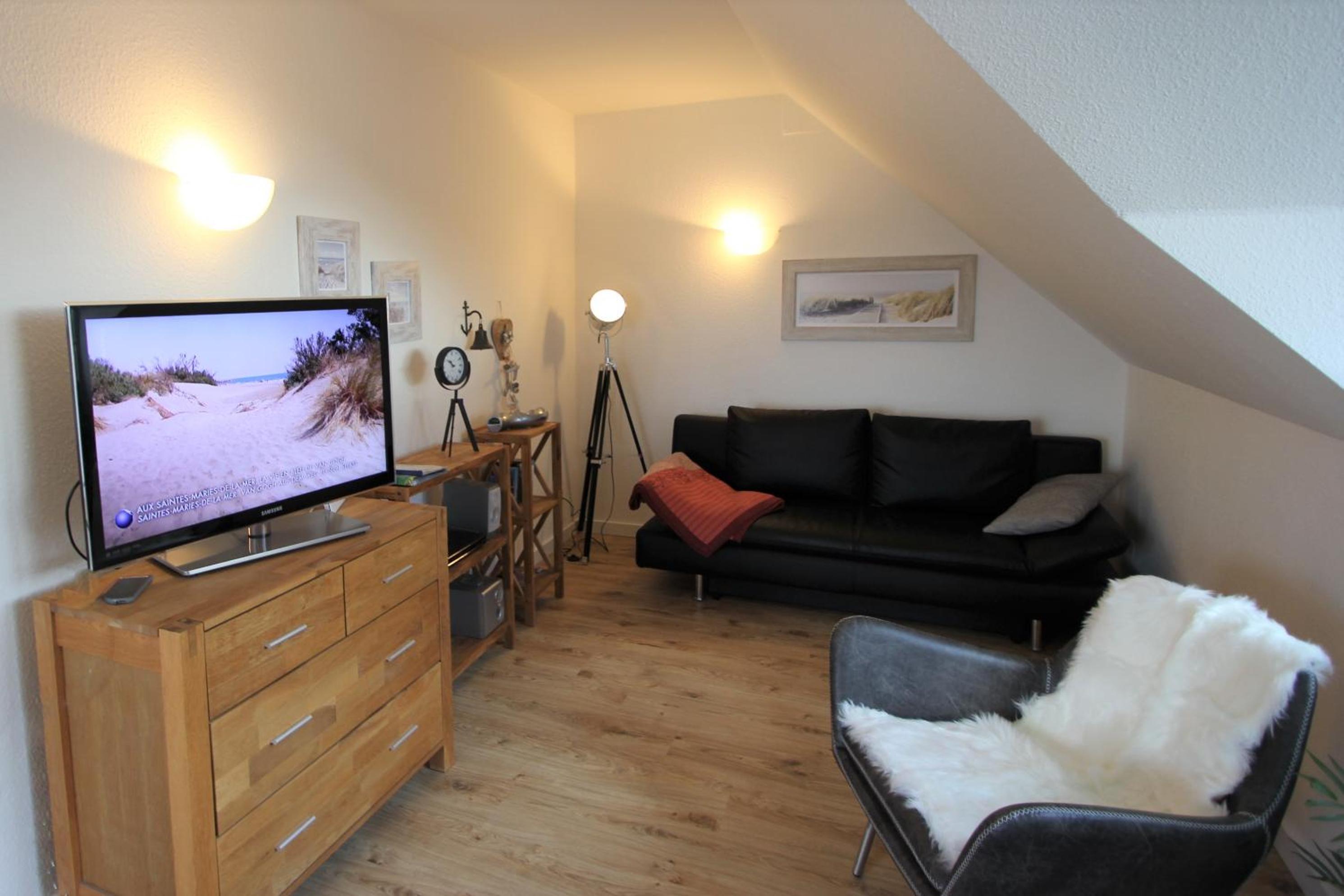 Ferienwohnung Tine mit Balkon, Fahrrädern und Strandkorb im Sommer