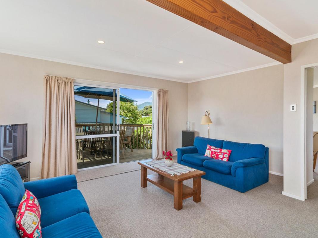 Family at Wharewaka - Wharewaka Holiday Home view 4