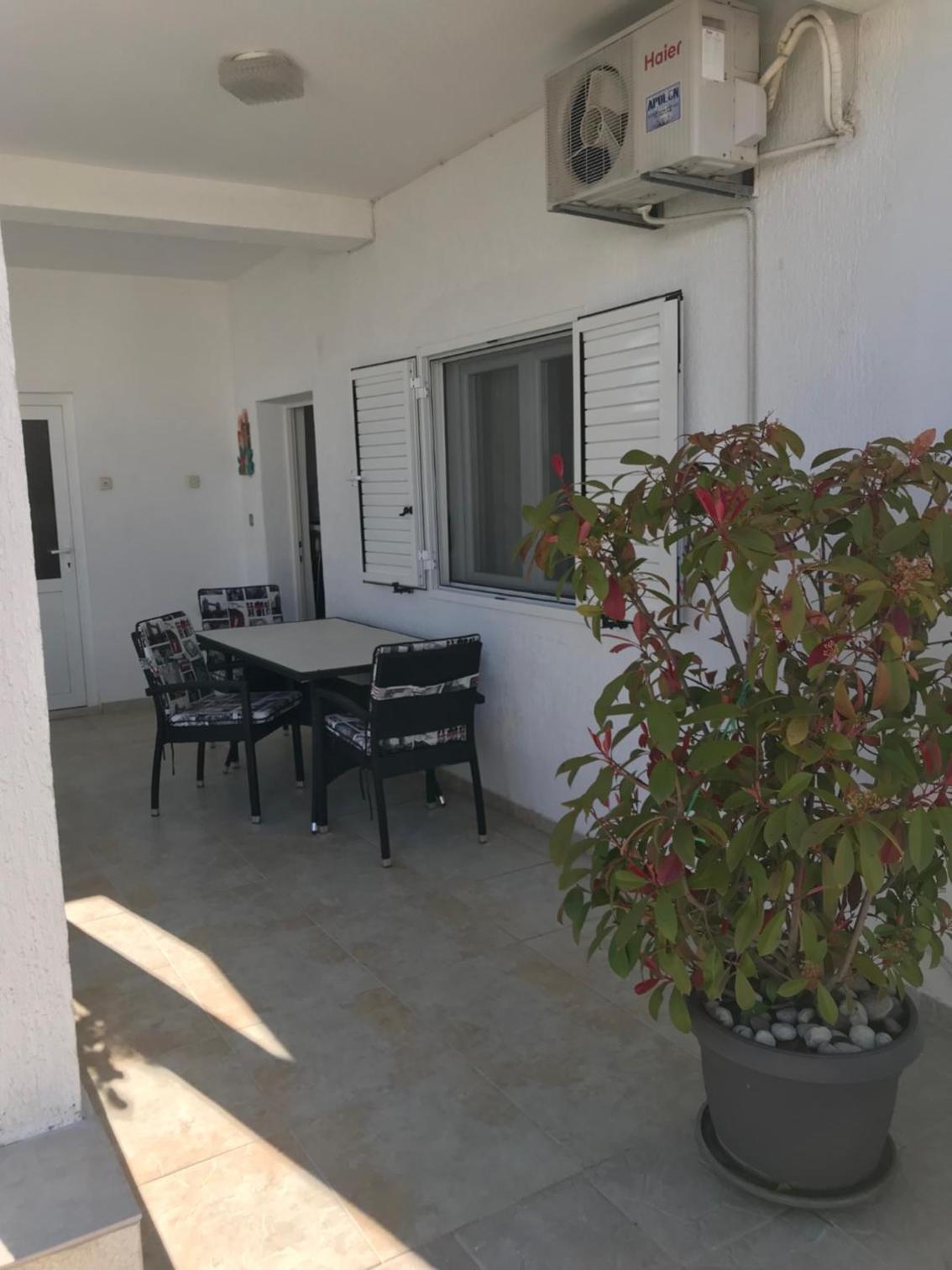 TONA APARTMENTS