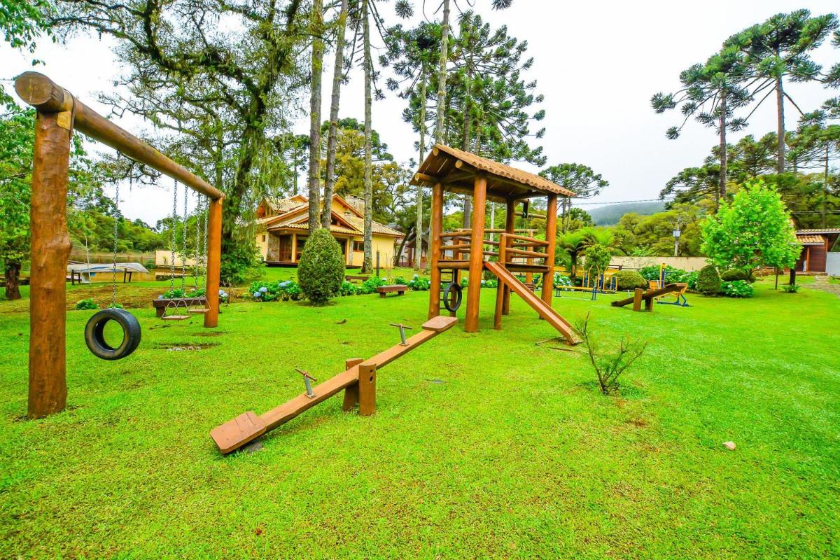 Casa com lareira e área gourmet em Monte Verde