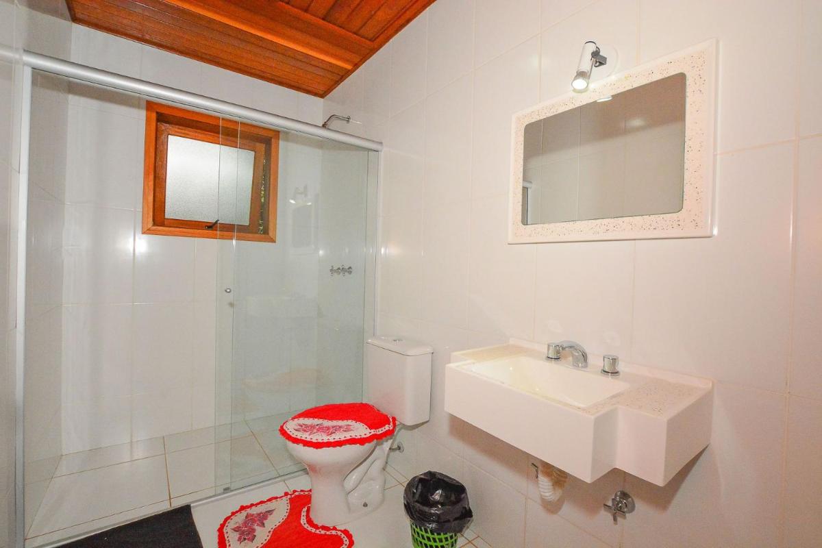Casa com lareira e área gourmet em Monte Verde