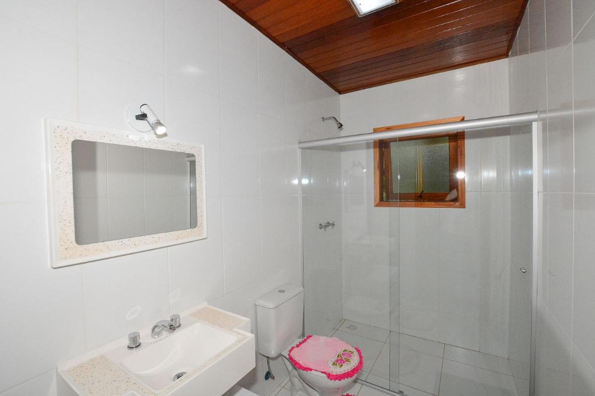 Casa com lareira e área gourmet em Monte Verde
