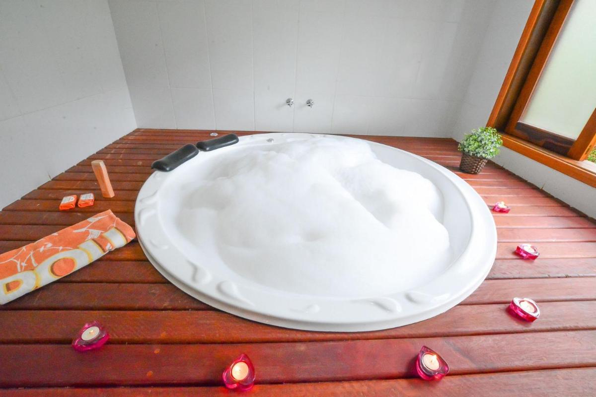 Casa com lareira e área gourmet em Monte Verde