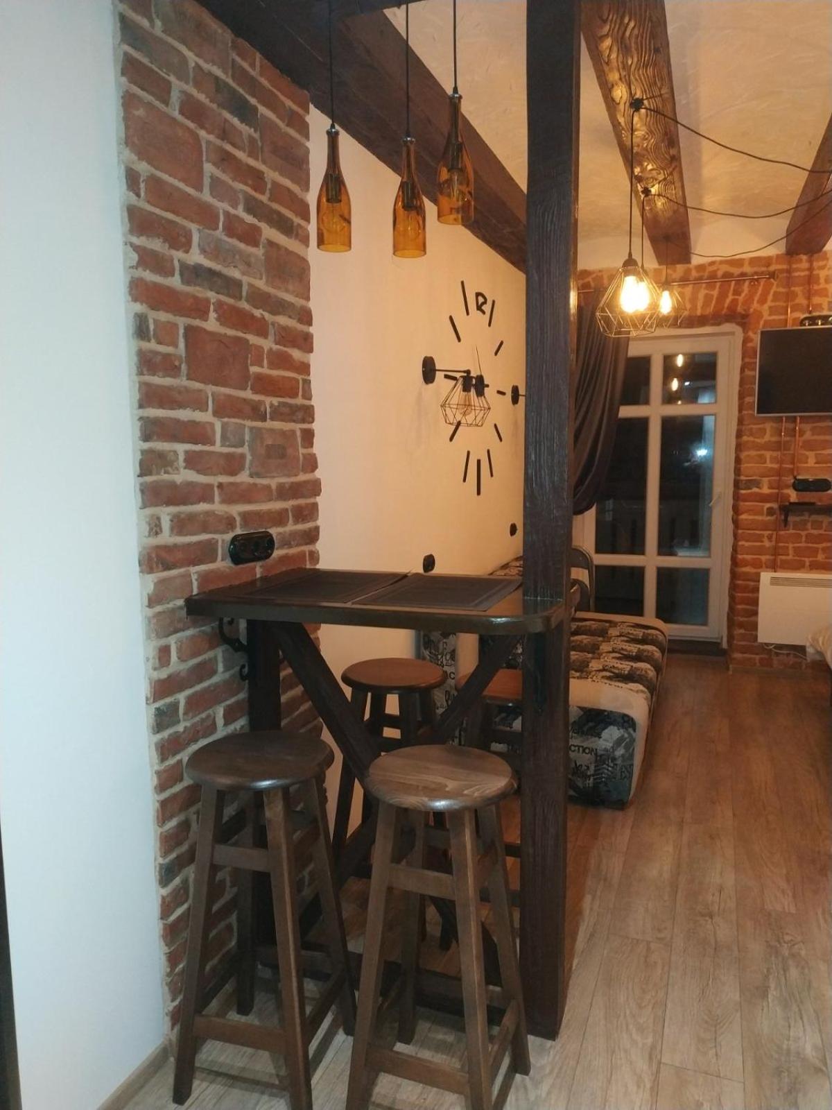 Loft апартаменти з балконом в центрі Львова