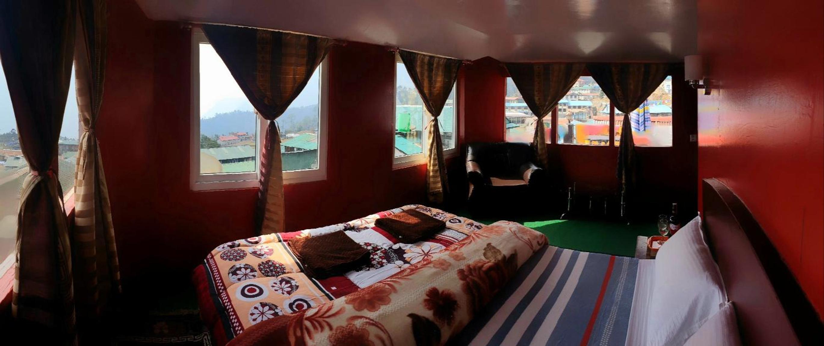 LAMA HOTEL - HIMALAYAN BURGER Experience the best stay in EVEREST with an unforgettable Mountain Flight