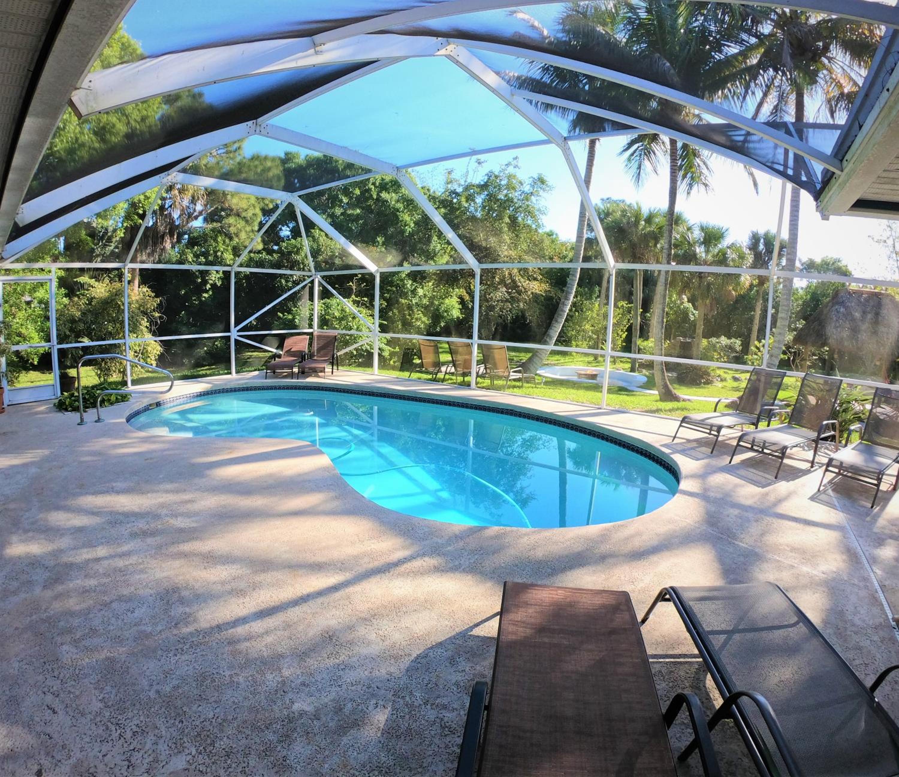 JUPITER WATERFALLS - NEWLY UPDATED - TIKI HUT, FIRE PIT, KITCHEN, POOL HEATER and MORE view 3