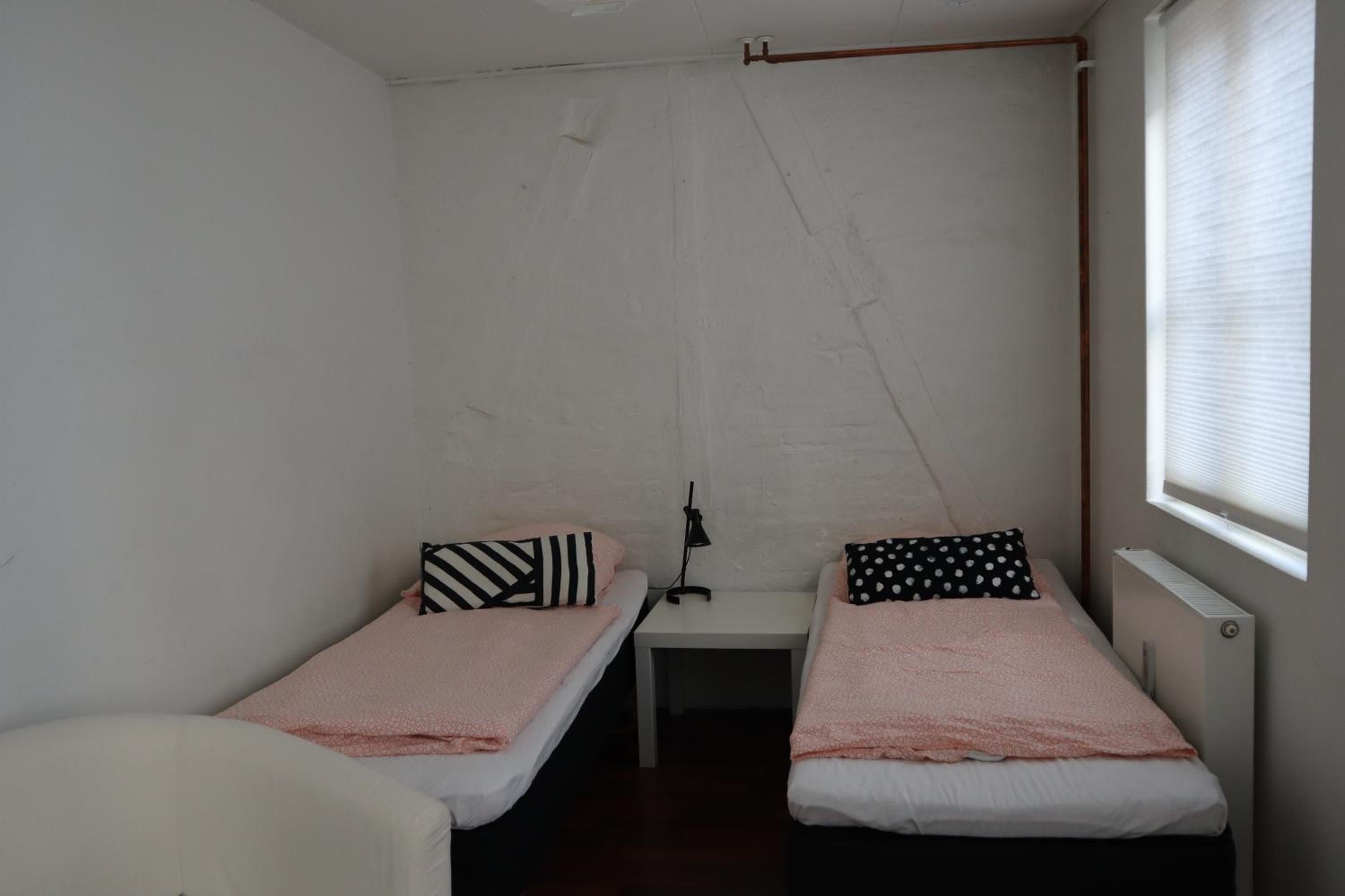 Rooms in quiet Yellow Courtyard Apartment