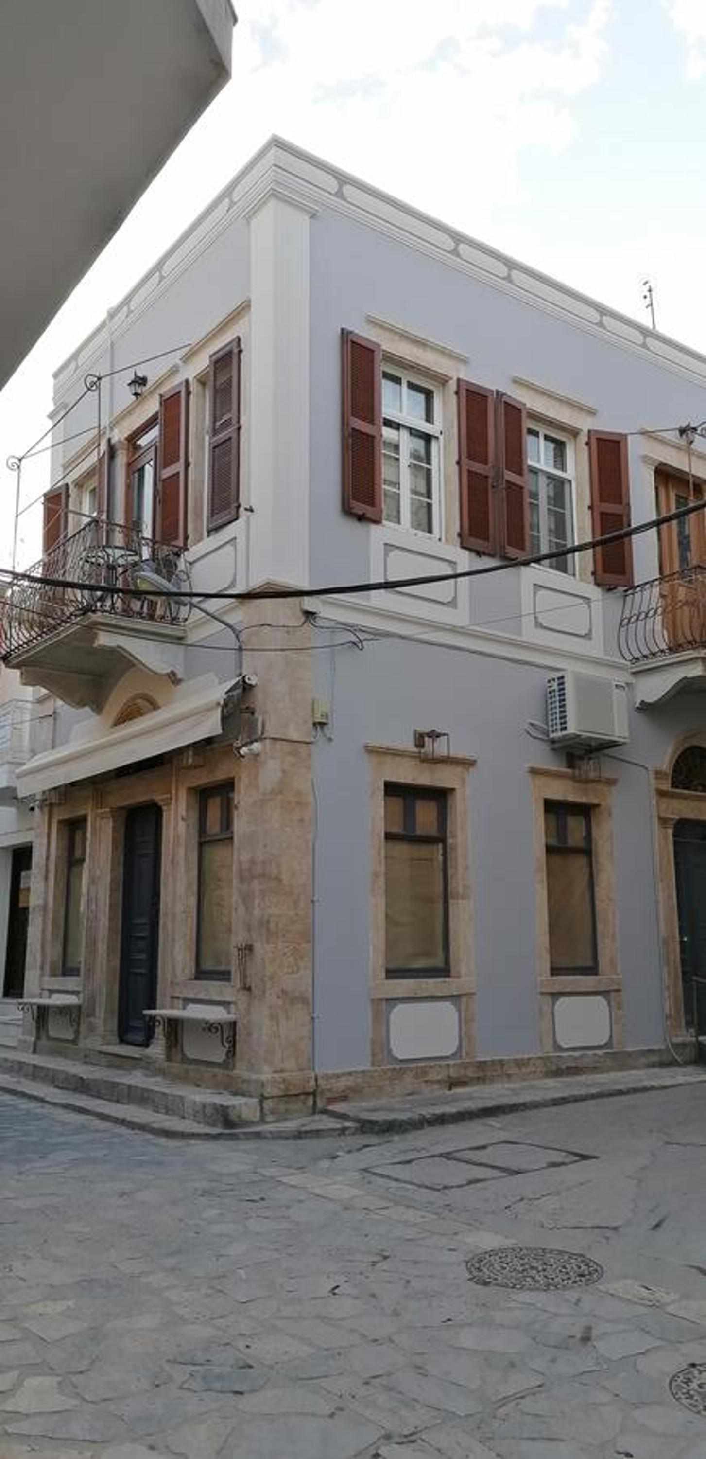 THEOS APARTMENTS view 3