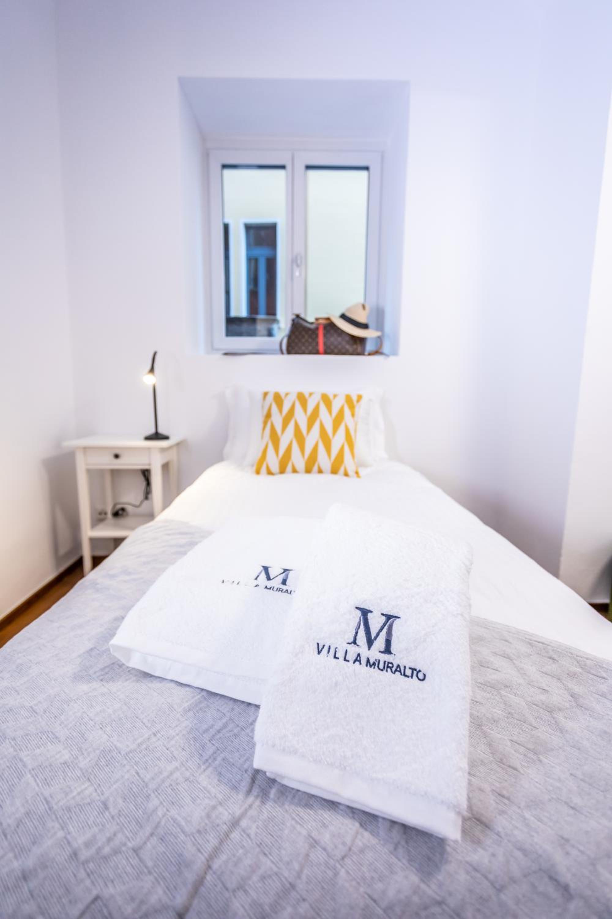 VILLA MURALTO Boutique Hotel Rooms and Garden