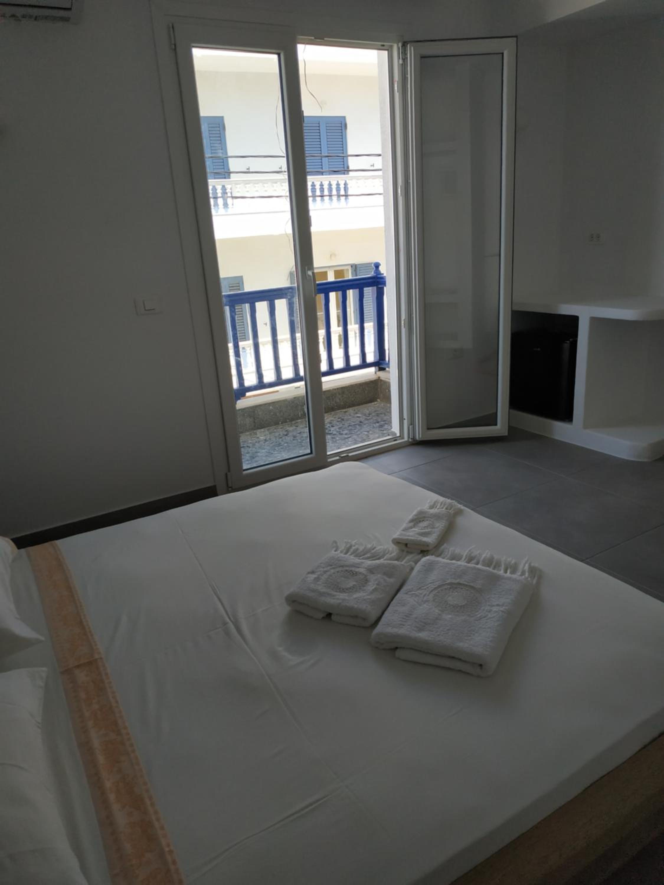 ENALION-TINOS
