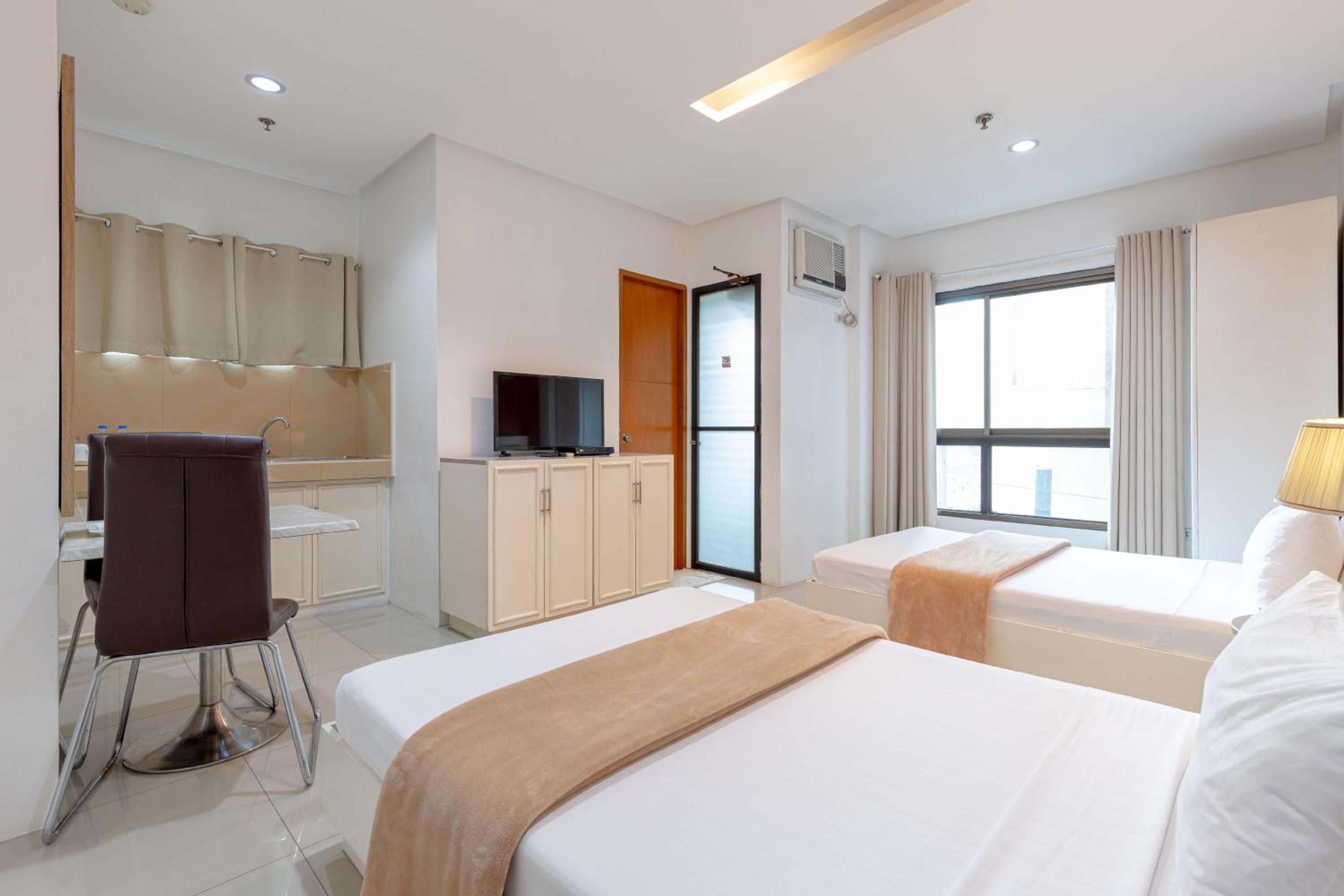 Baymont Suites & Residences