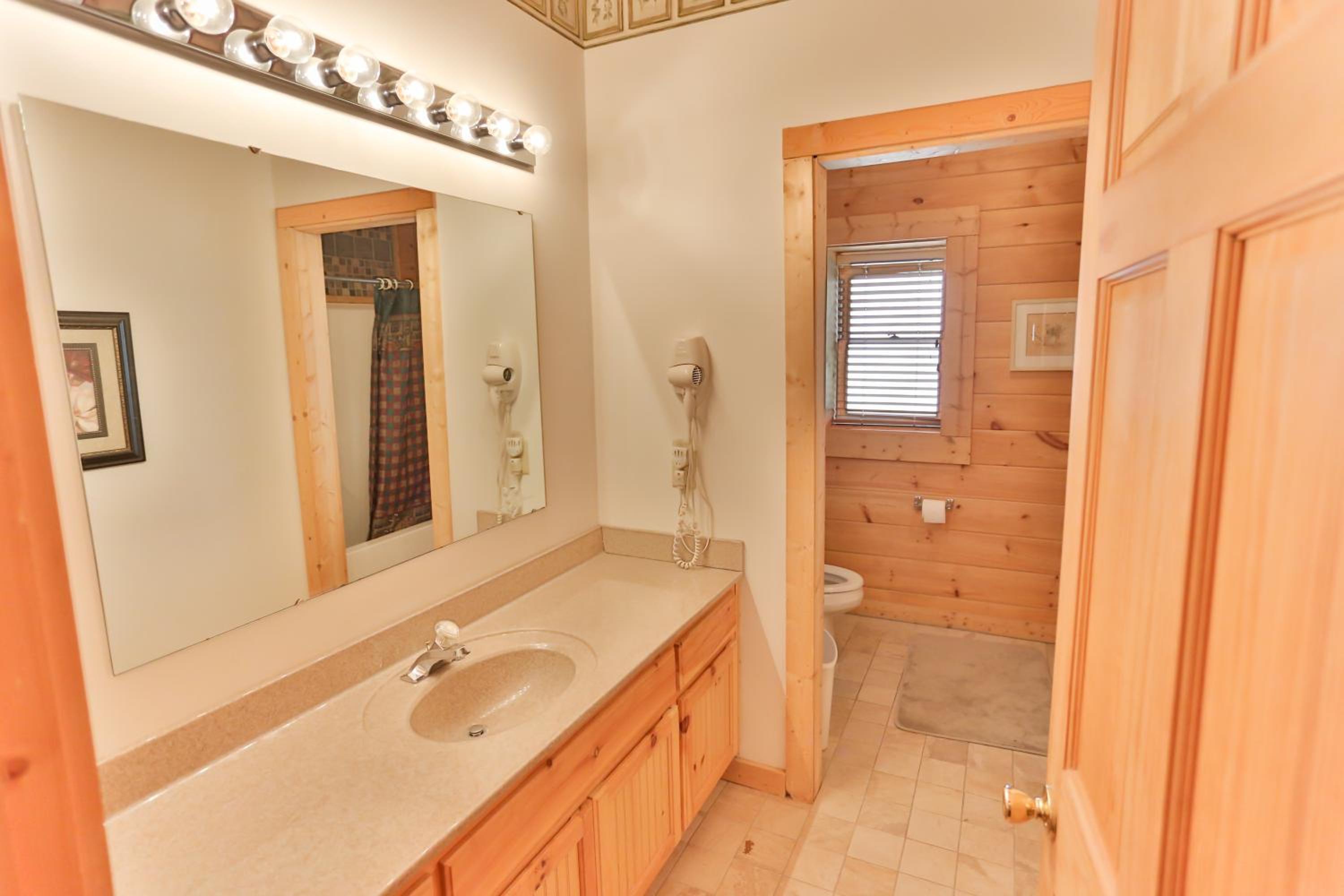 Log Inn, 5 bed 3 bath group cabin in Gatlinburg with game room and hot tub, seasonal resort pool view 3