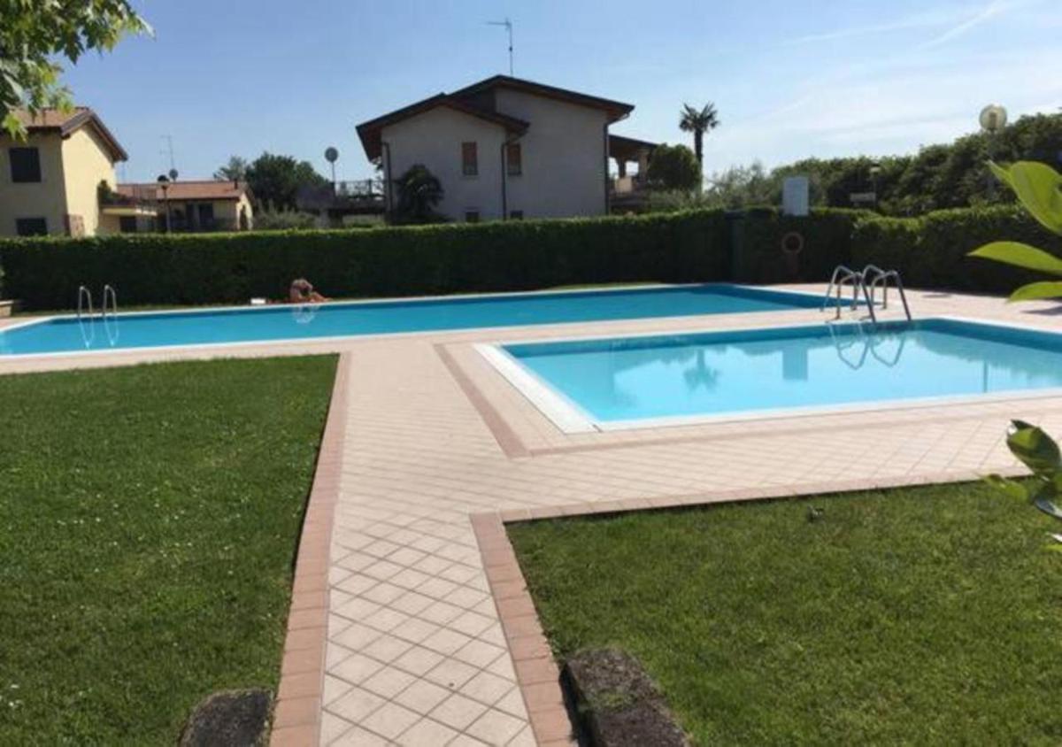 Hotel Appartamento con Piscina a Lazise - Image 1
