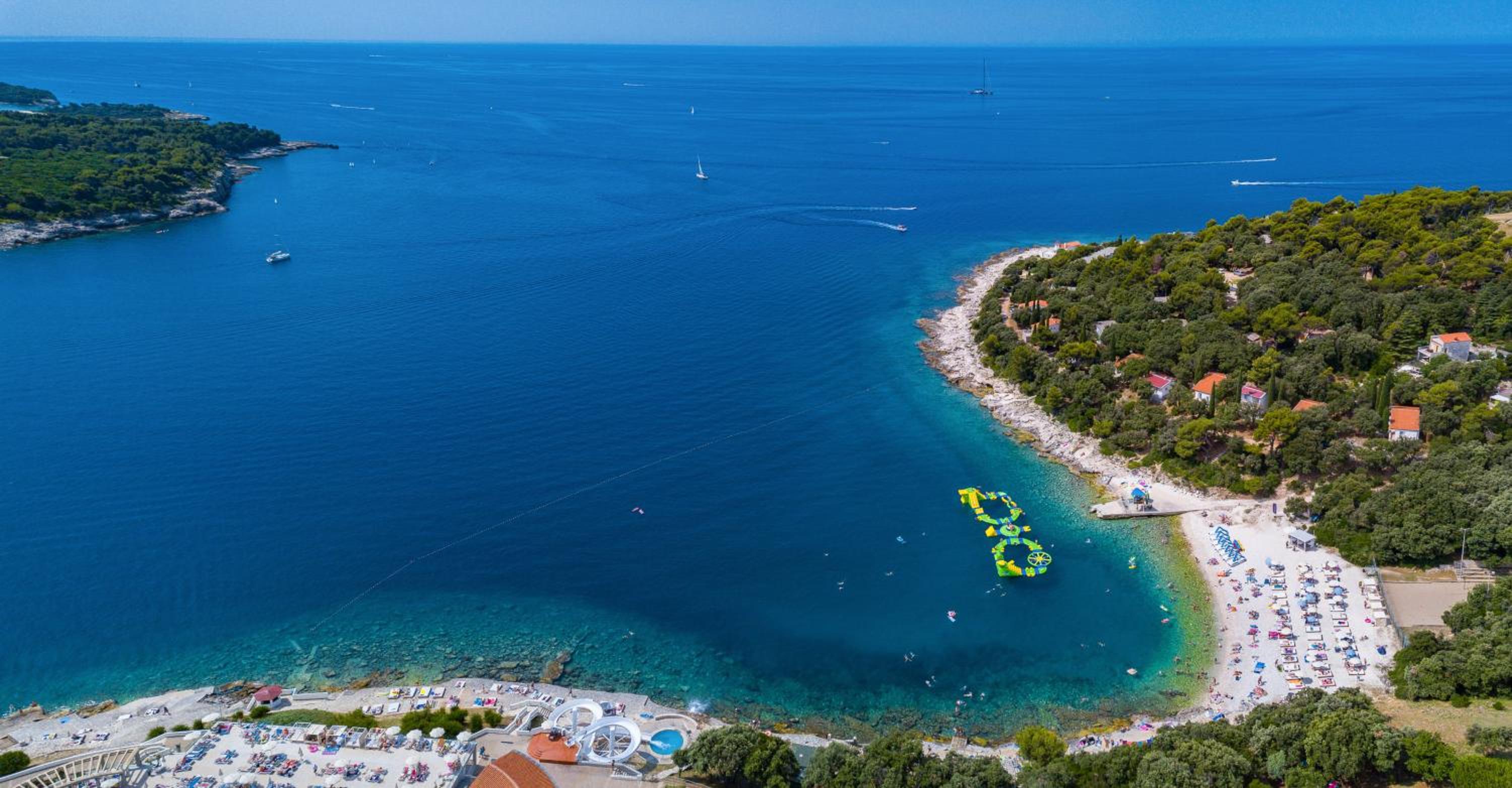 Villa Andrija Family Dream with heated pool at the sea with beautiful garden, outside cinema and kids playground