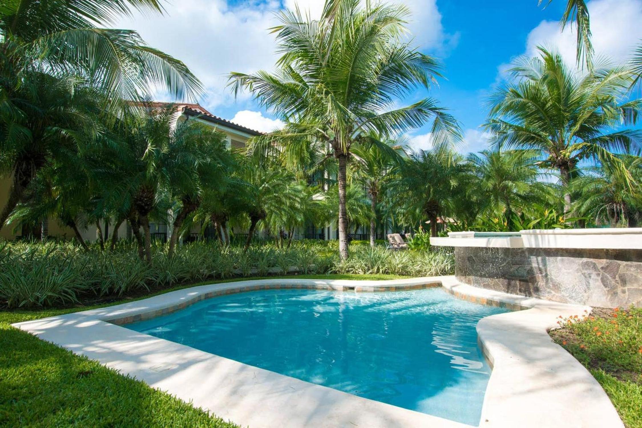 Coastal-Inspired Condo with a Pool-View Balcony & Beach Club Access view 3