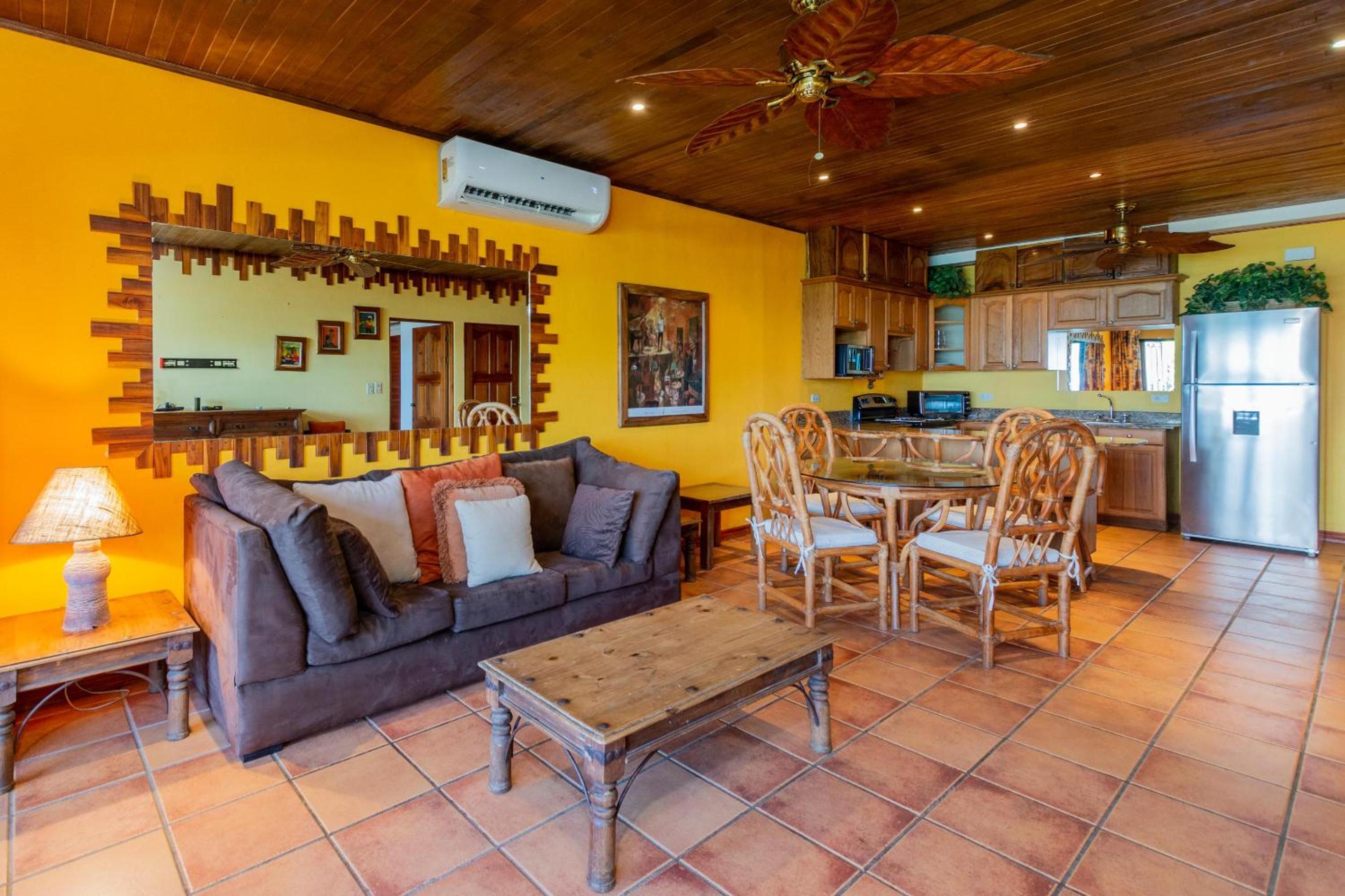 Beachfront Condo with Warm, Rustic Interiors & Direct Access to Playa Flamingo view 3
