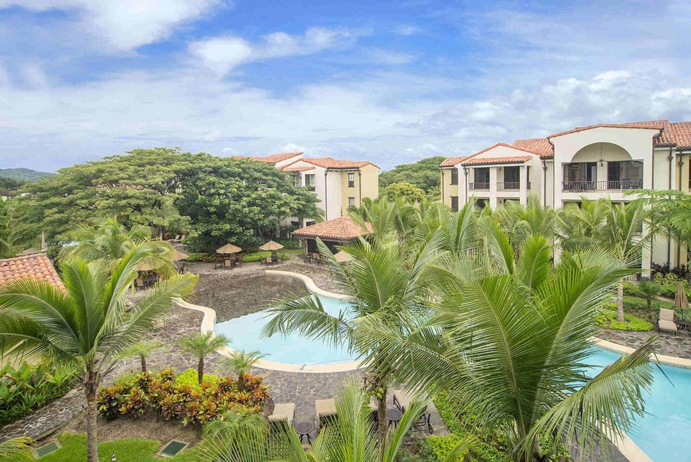 Impressively designed and decorated 3rd-floor space overlooking pool in Coco