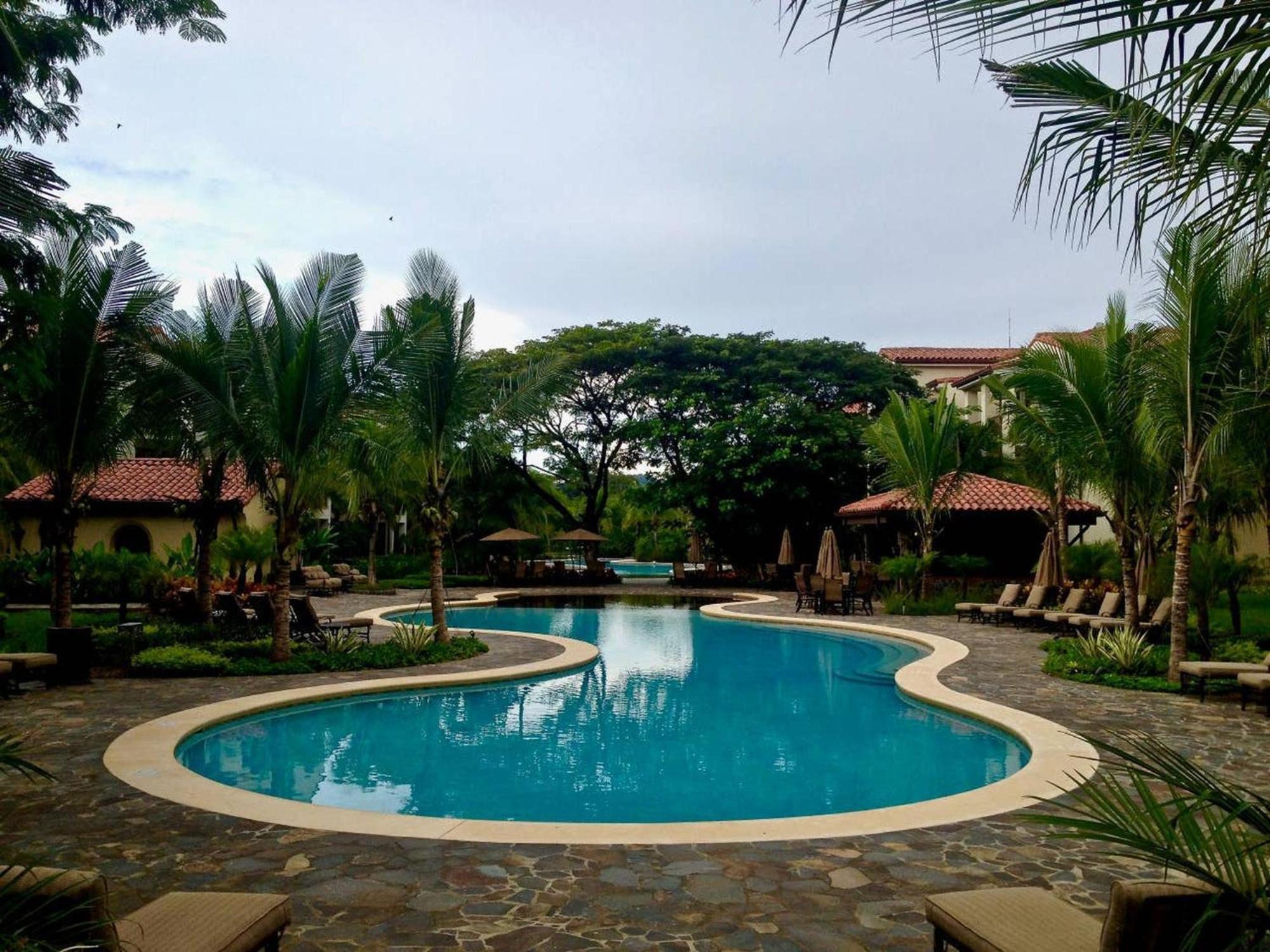 Impressively designed and decorated 3rd-floor space overlooking pool in Coco