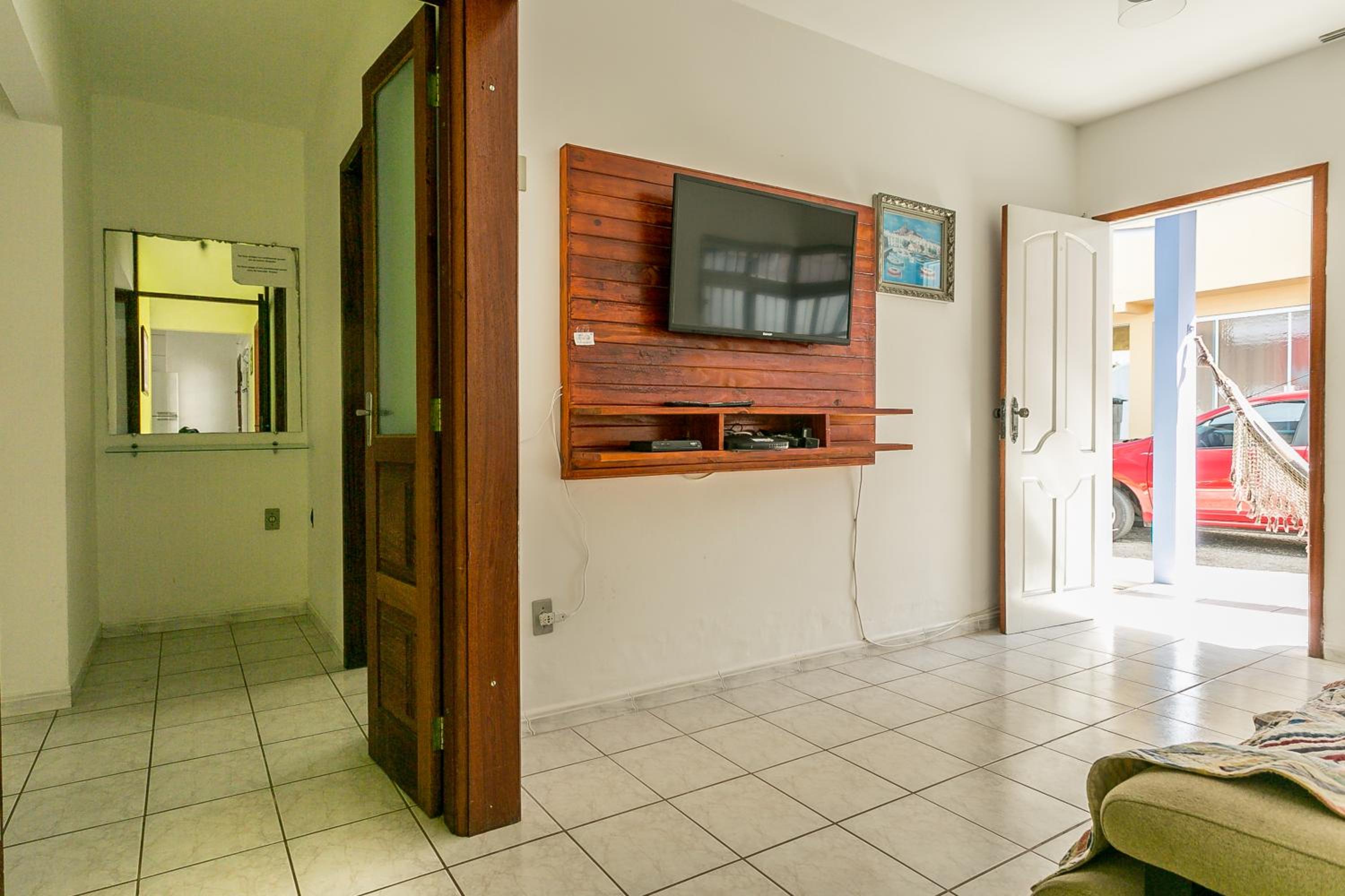 Casa 150m da praia em pátio familiar