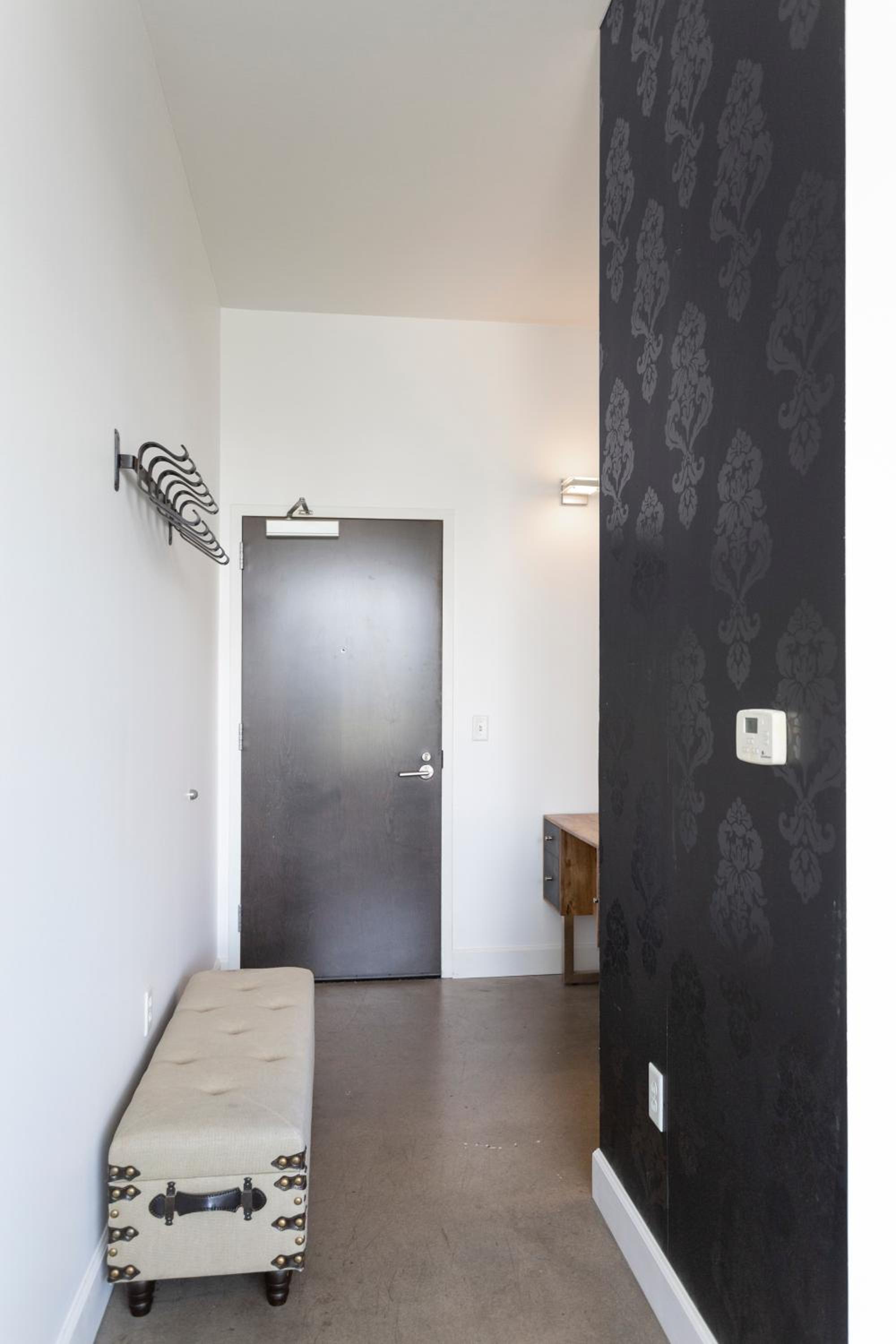 Soak up the Opulent Feel of a Lavish Monochrome Abode view 2