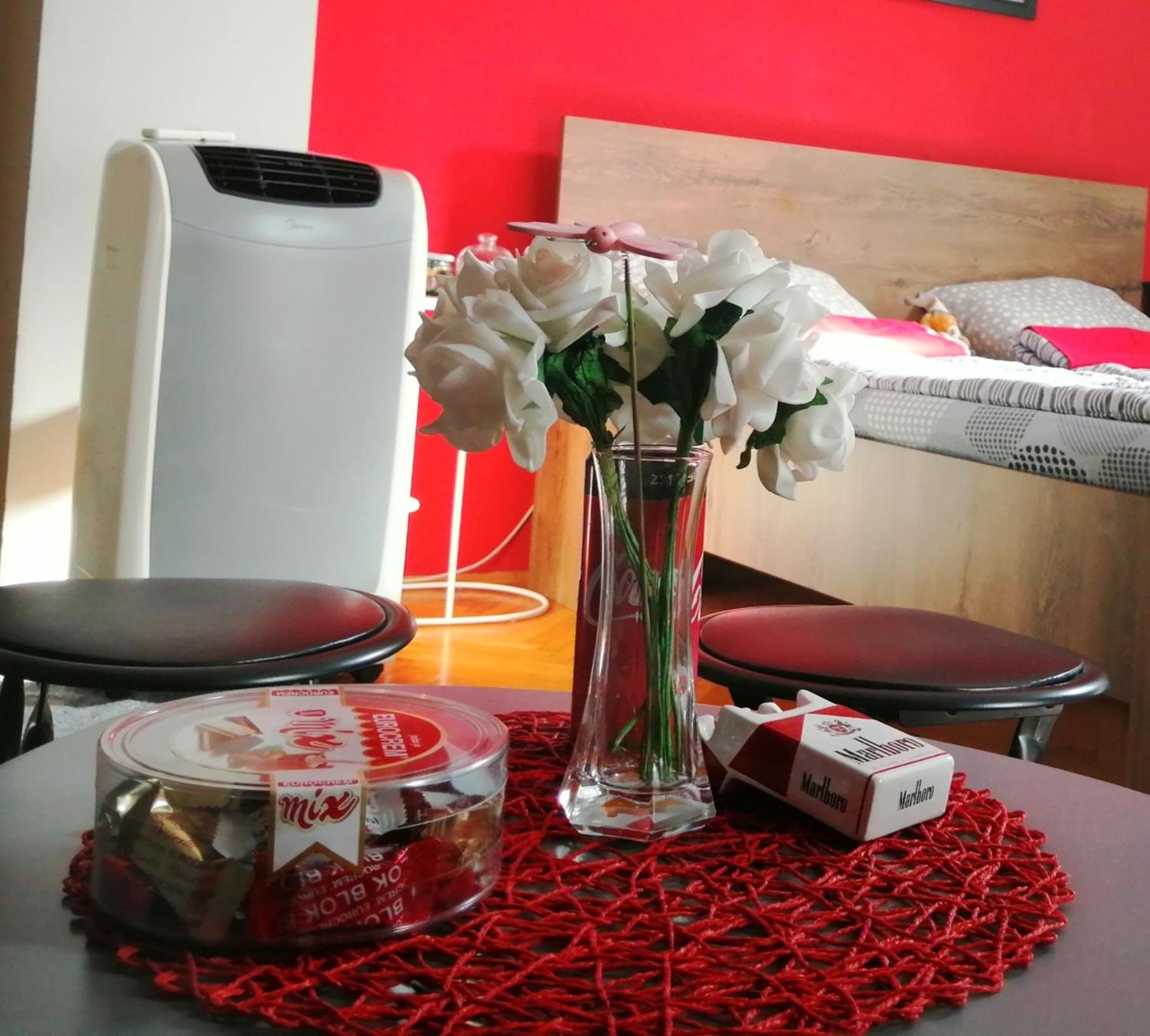 Apartman Red wall view 2