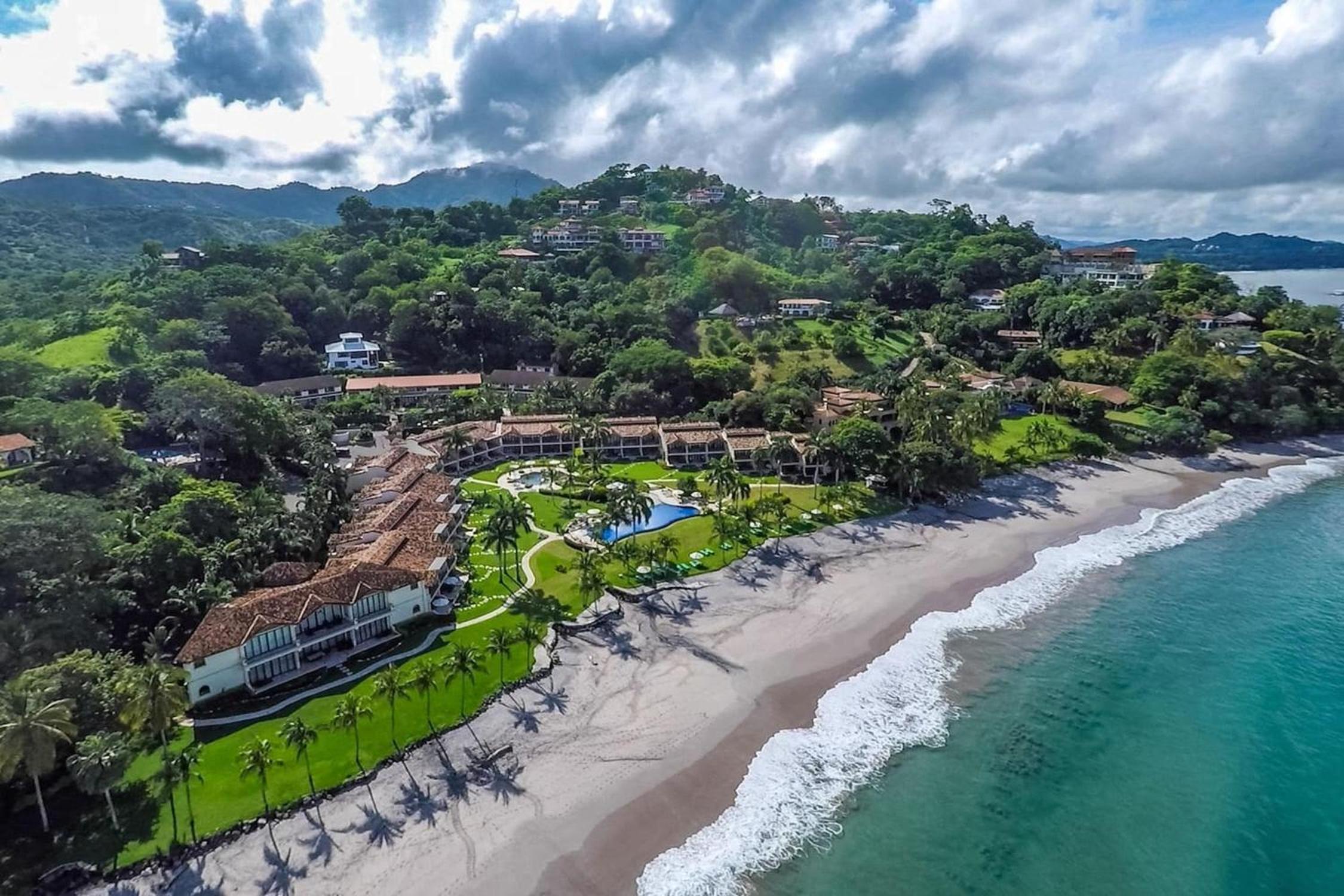 Modern Oceanfront Condo with a Chic Coastal Design, Resort-Style Amenities, and Direct Beach Access