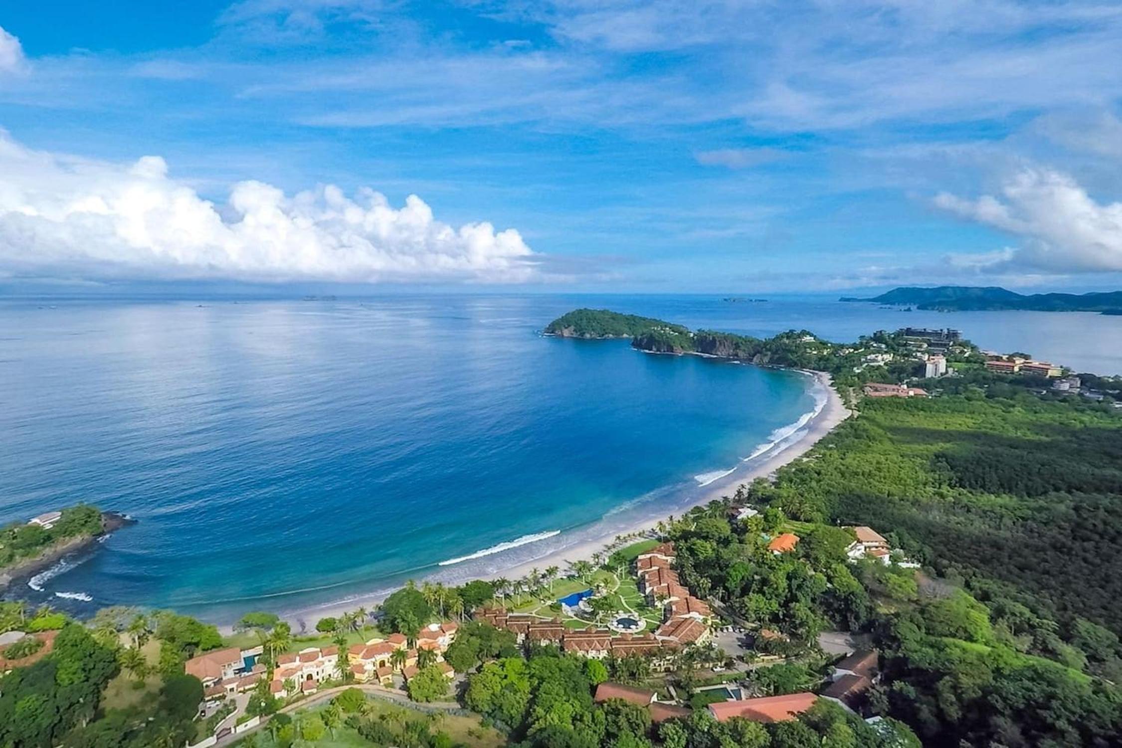 Modern Oceanfront Condo with a Chic Coastal Design, Resort-Style Amenities, and Direct Beach Access