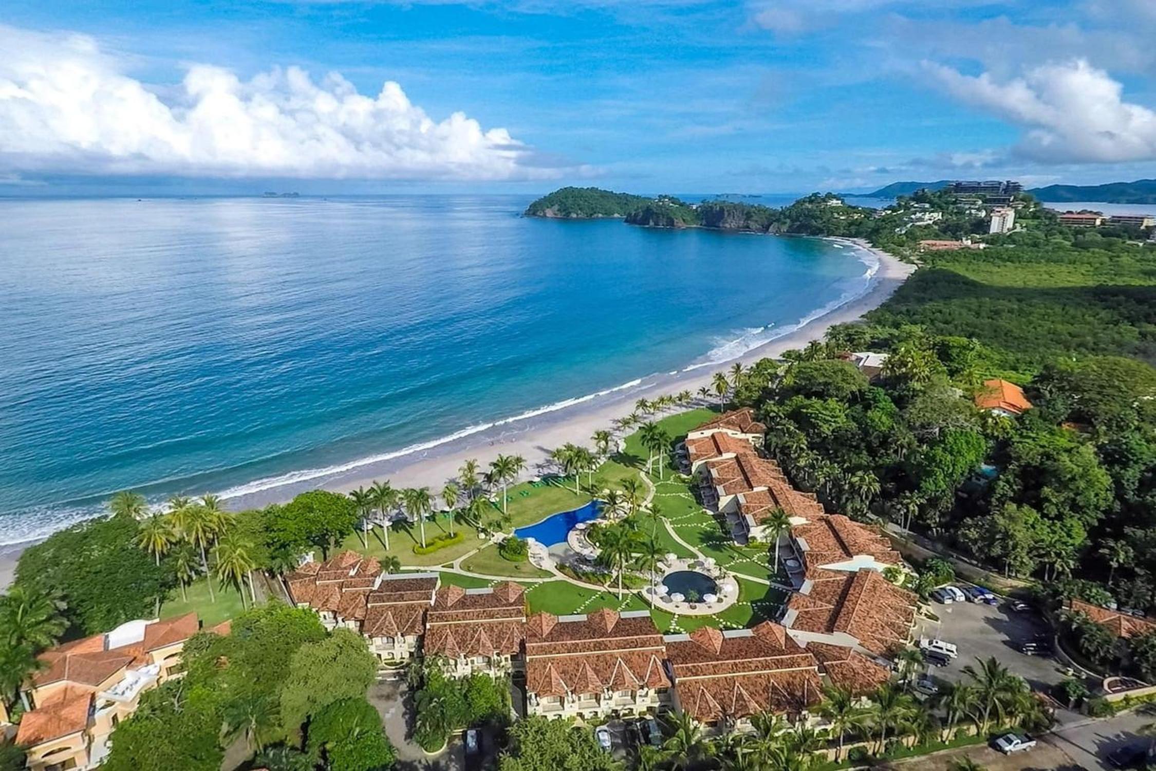 Modern Oceanfront Condo with a Chic Coastal Design, Resort-Style Amenities, and Direct Beach Access