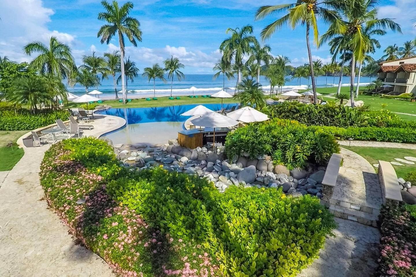 Modern Oceanfront Condo with a Chic Coastal Design, Resort-Style Amenities, and Direct Beach Access