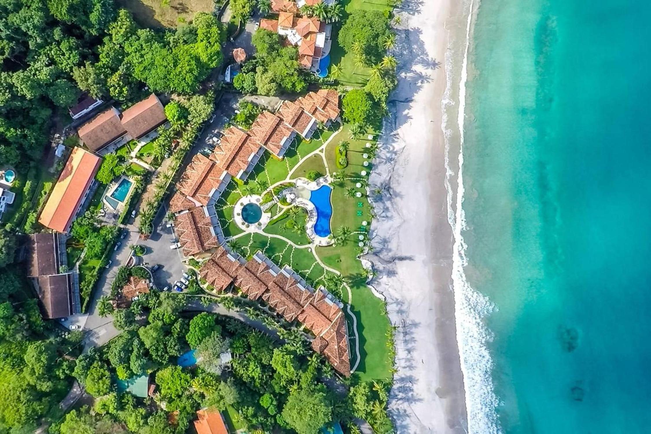 Modern Oceanfront Condo with a Chic Coastal Design, Resort-Style Amenities, and Direct Beach Access