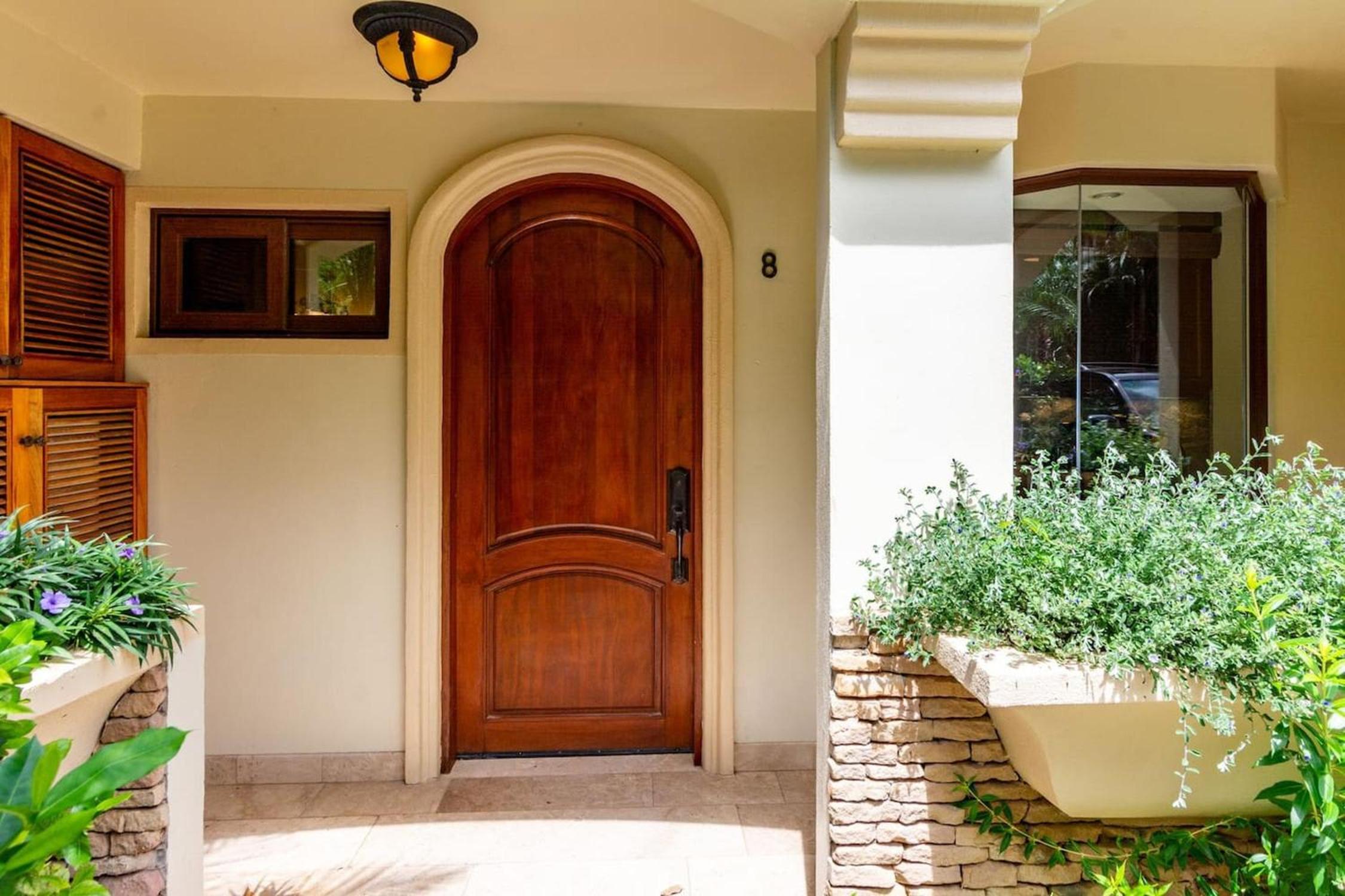 Stylish Split-Level Condo with a Shaded Terrace, Direct Beach Access, and Resort-Style Community Amenities view 2