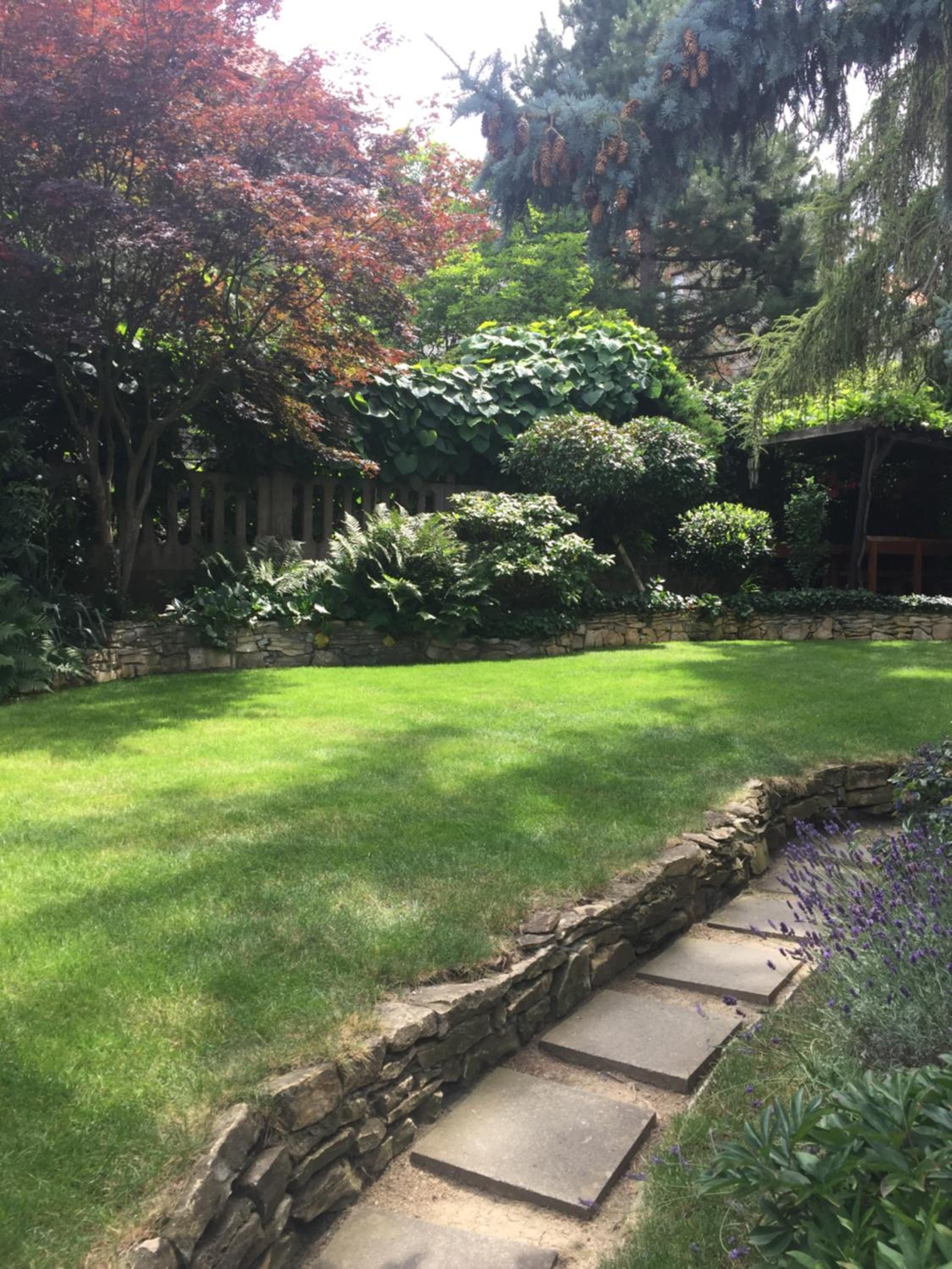 Blue apartment in beautiful English style garden with atmosphere