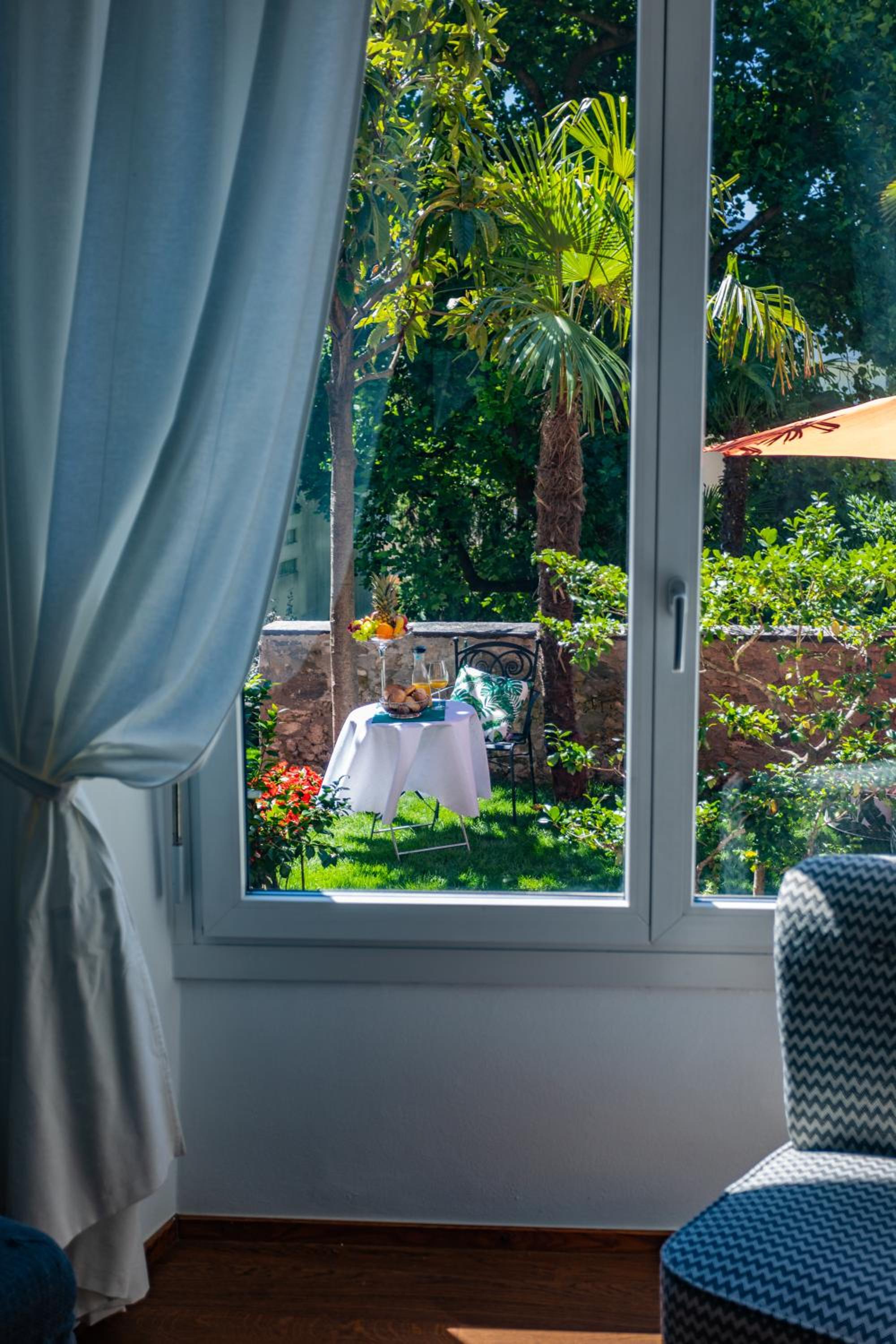 VILLA MURALTO Boutique Hotel Rooms and Garden