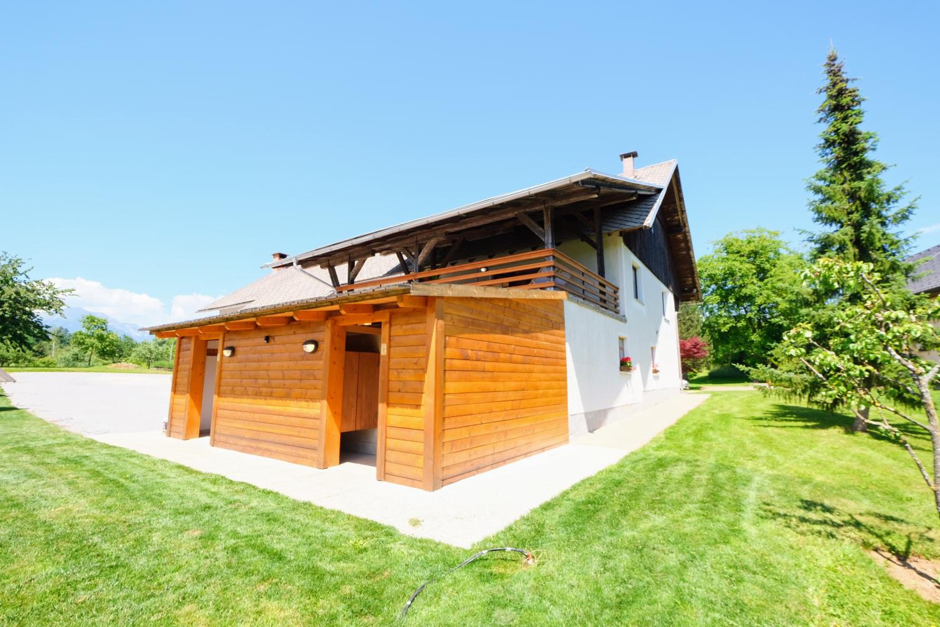 Hotel Small wooden houses and Apartments Zgornja Dobrava - Image 1