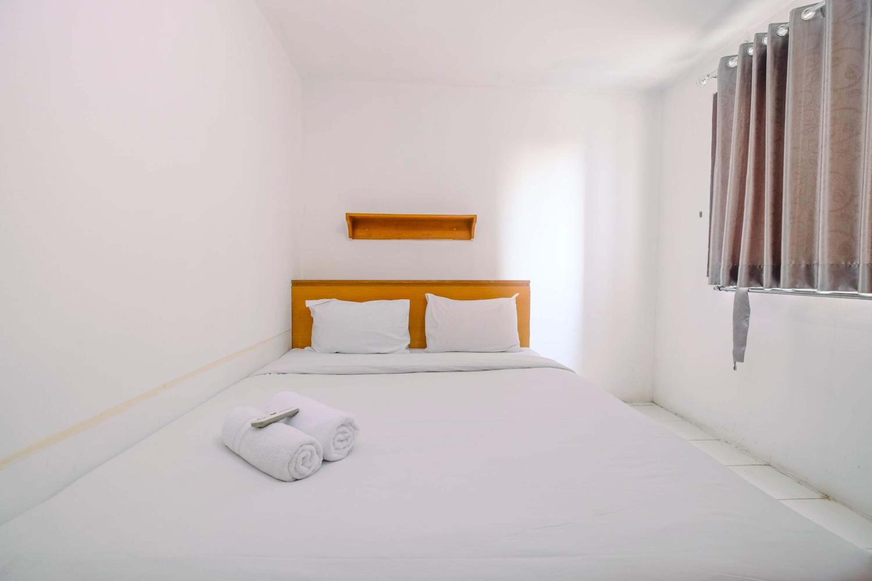 New Furnished 1BR Rajawali Apartment By Travelio view 3