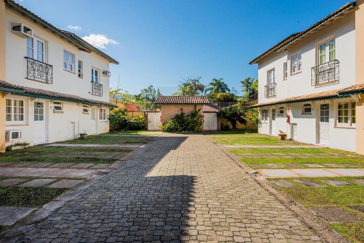 Novo Bhaus Juqueí - Churrasqueira Privativa - Piscina - 2 vagas - Condomínio com 8 casas - 600m da Praia - não possui roupa de cama e banho